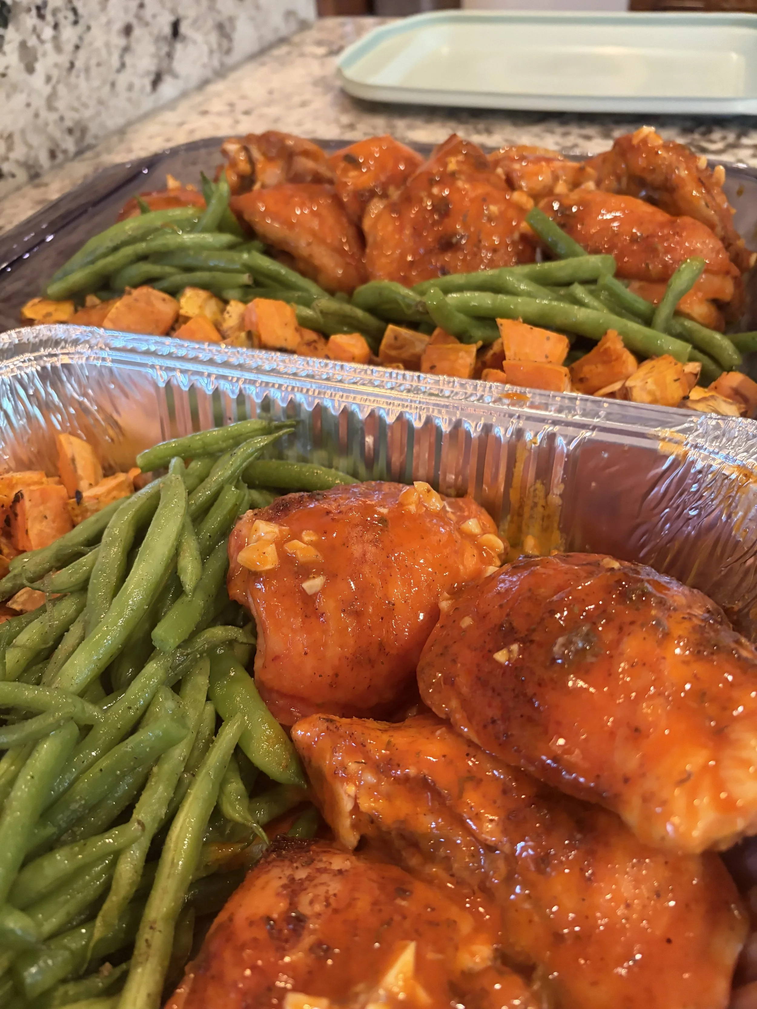 Buffalo Chicken Thighs, green beans and roasted sweets