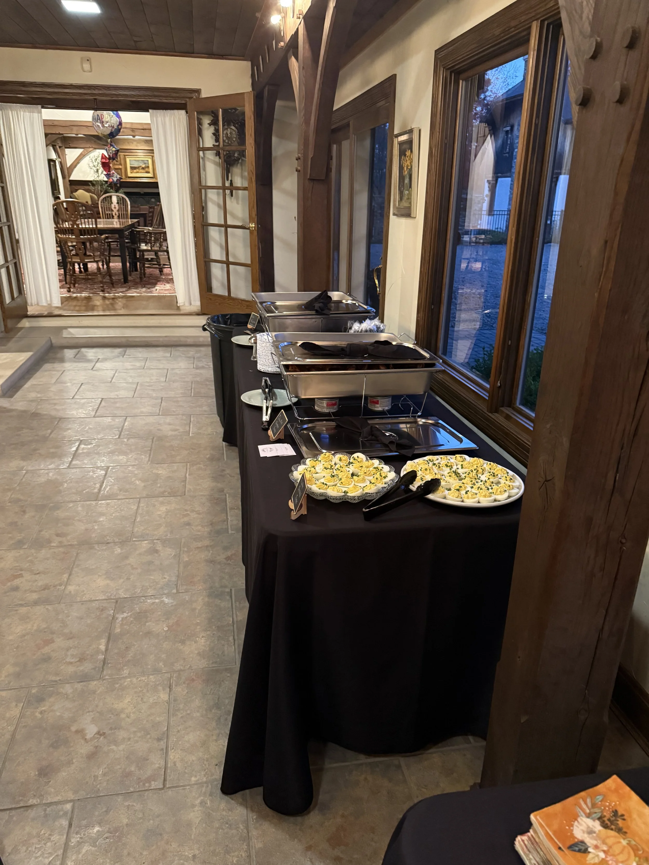 Set up of a small buffet in the Hearth Room