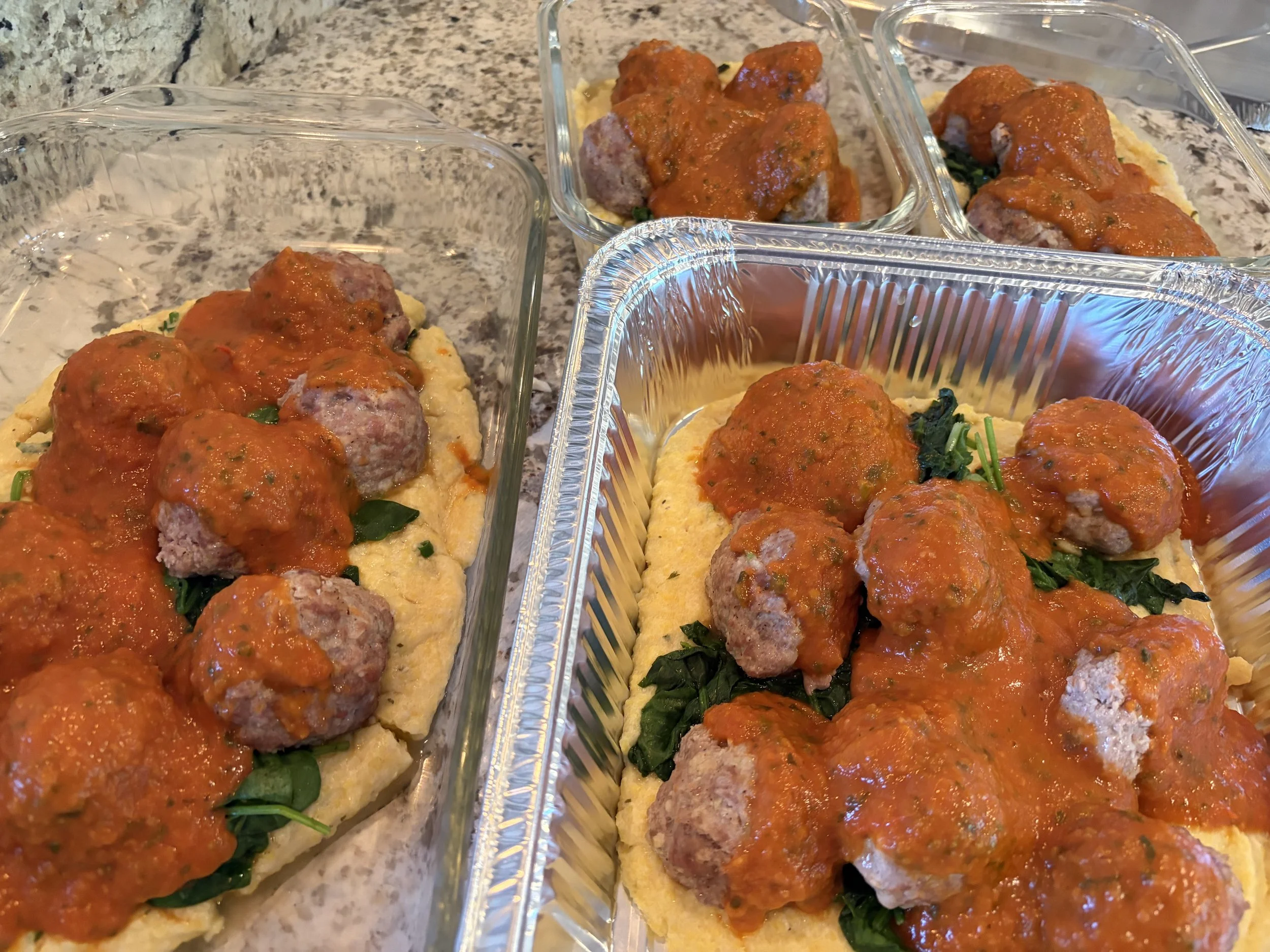 Pork and Ricotta meatballs, sauteed greens and polenta