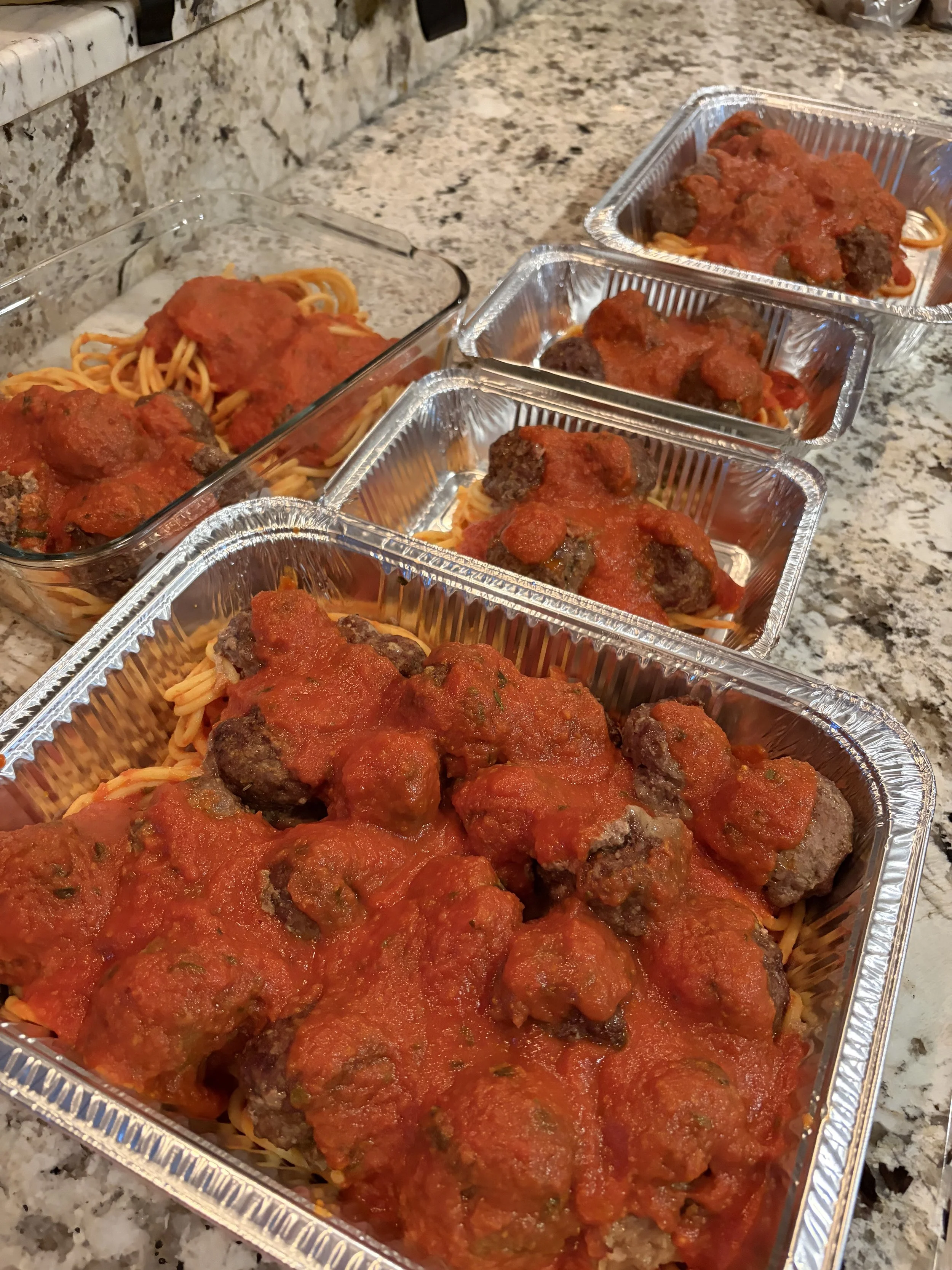 Italian meatballs, red sauce and bucatini