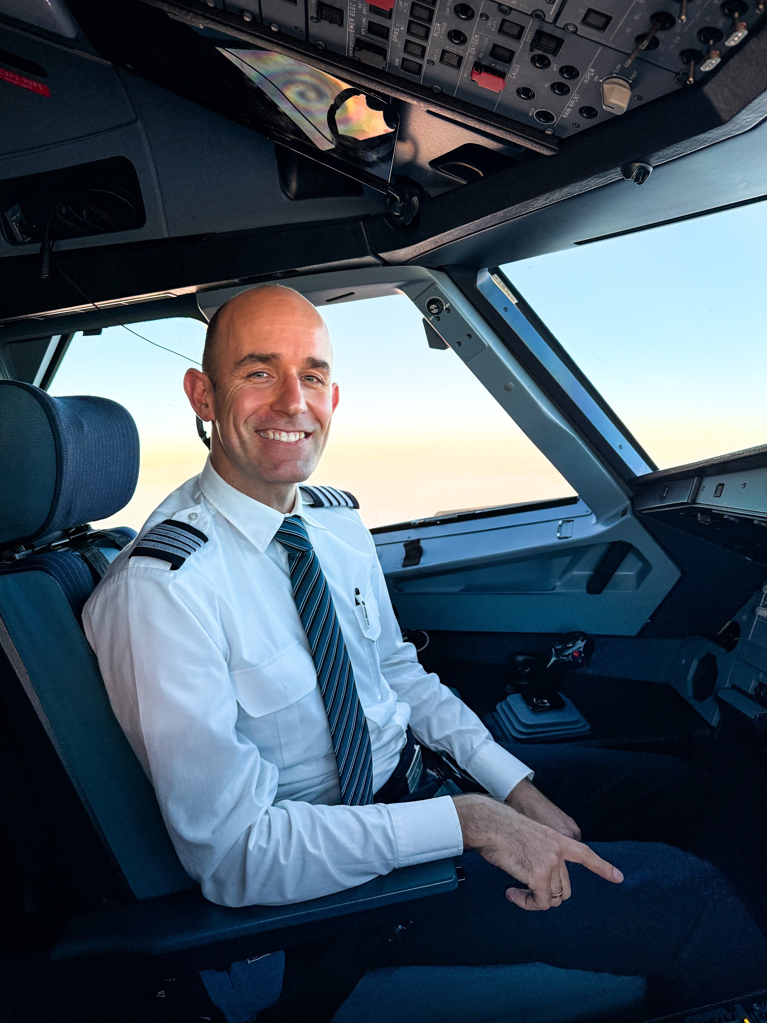 Lendvay, a Senior Training Captain and former airline recruiter, in the cockpit