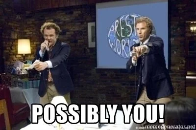 Two men in suits performing on stage with a large screen behind them displaying the words "PREST WORK" and text "POSSIBLY YOU!" at the bottom.