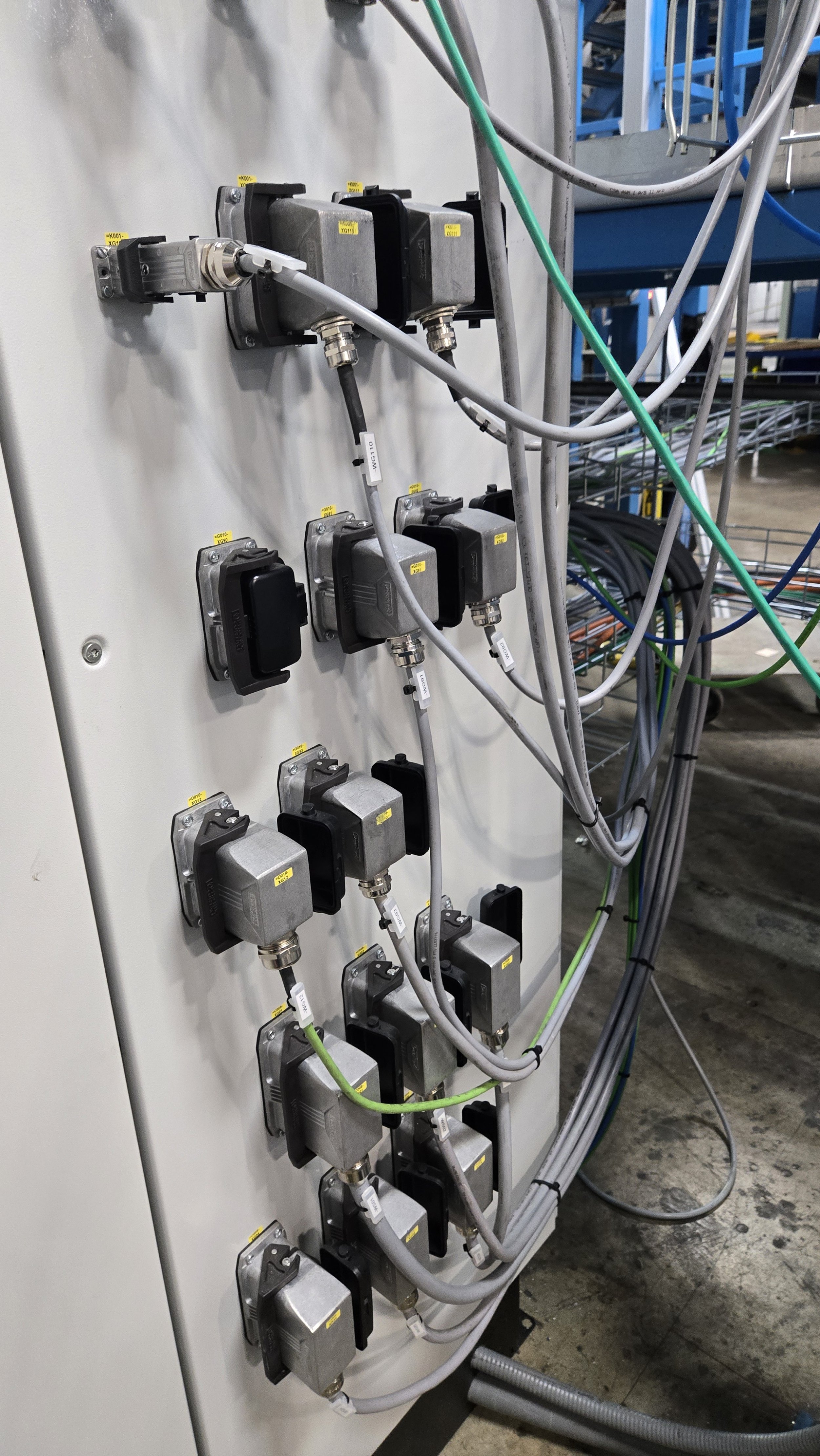 Device Cables plugging in to both sides of main PLC cabinet