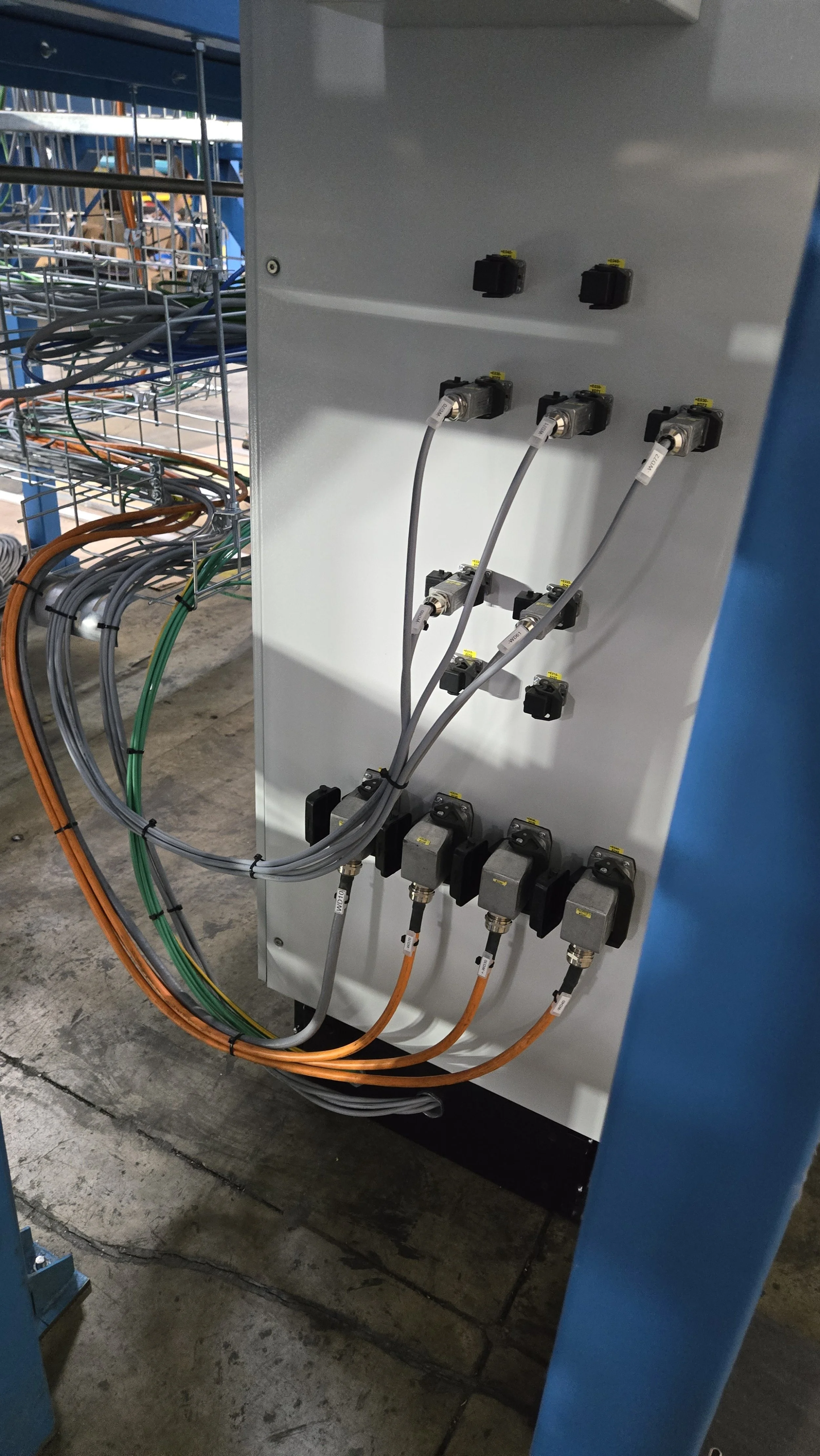 Cables from installed E Stops, Start/Stop push buttons, welding stations, HMIs etc.