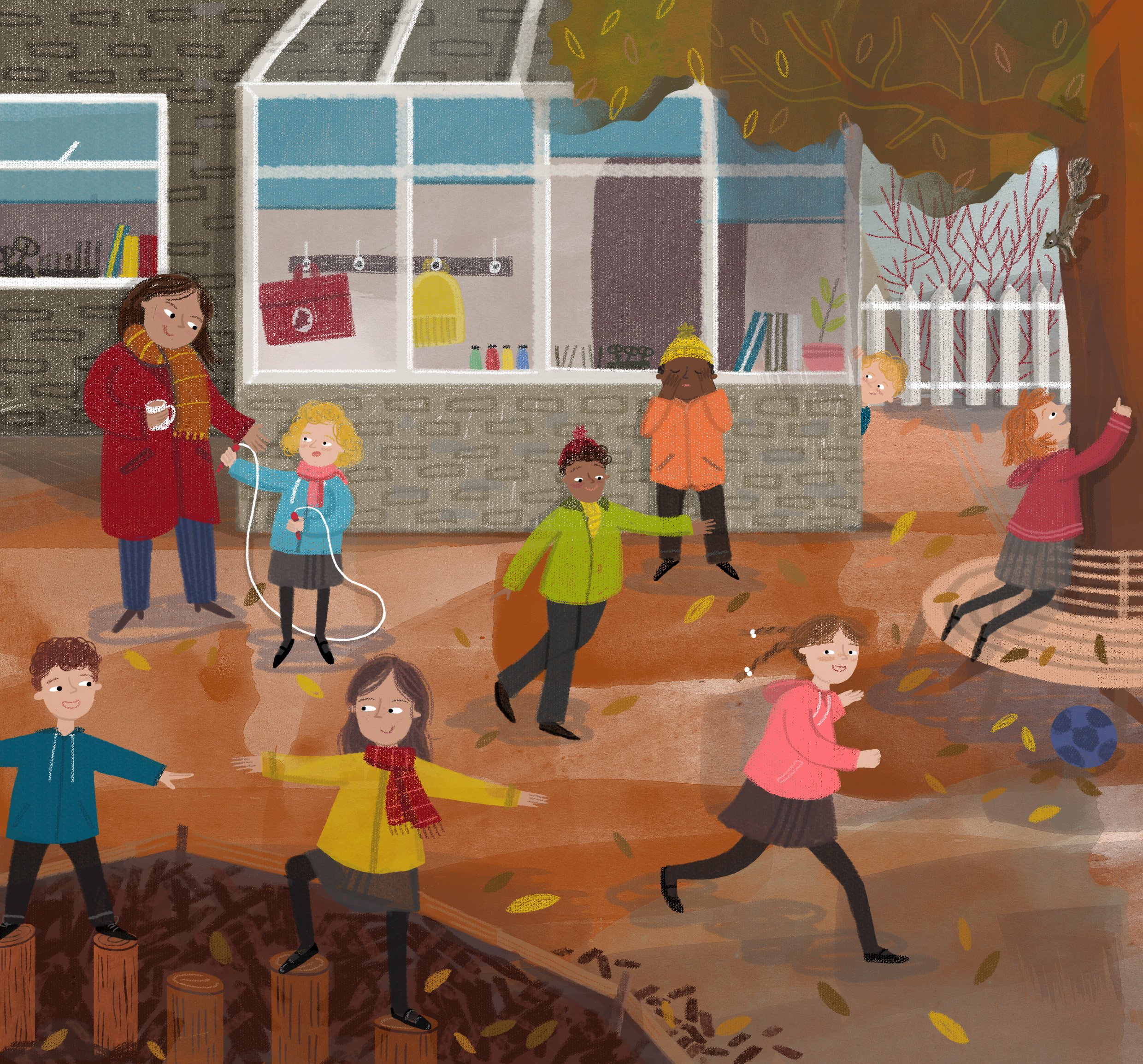 Children playing in the school playground on an autumn day