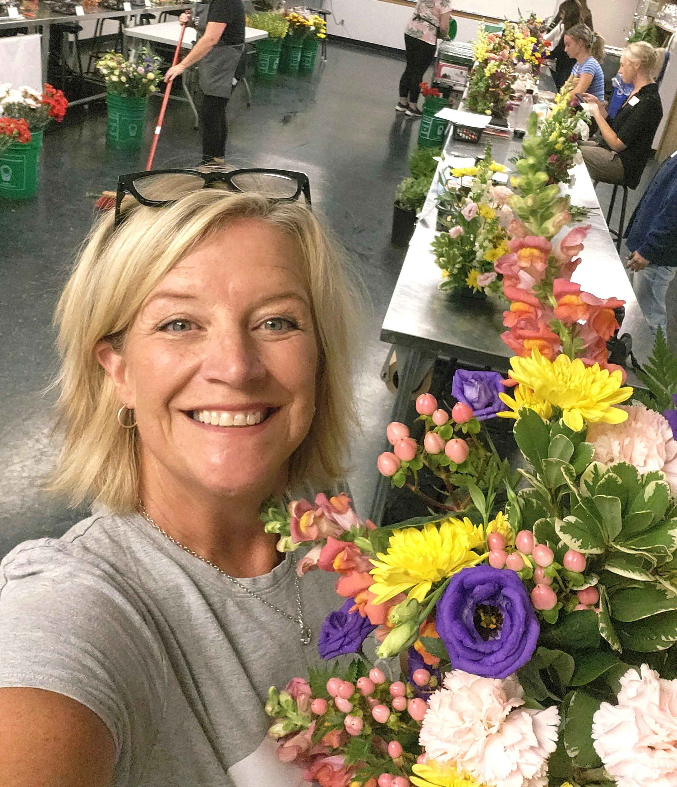 Happiest while creating artistry with flowers!