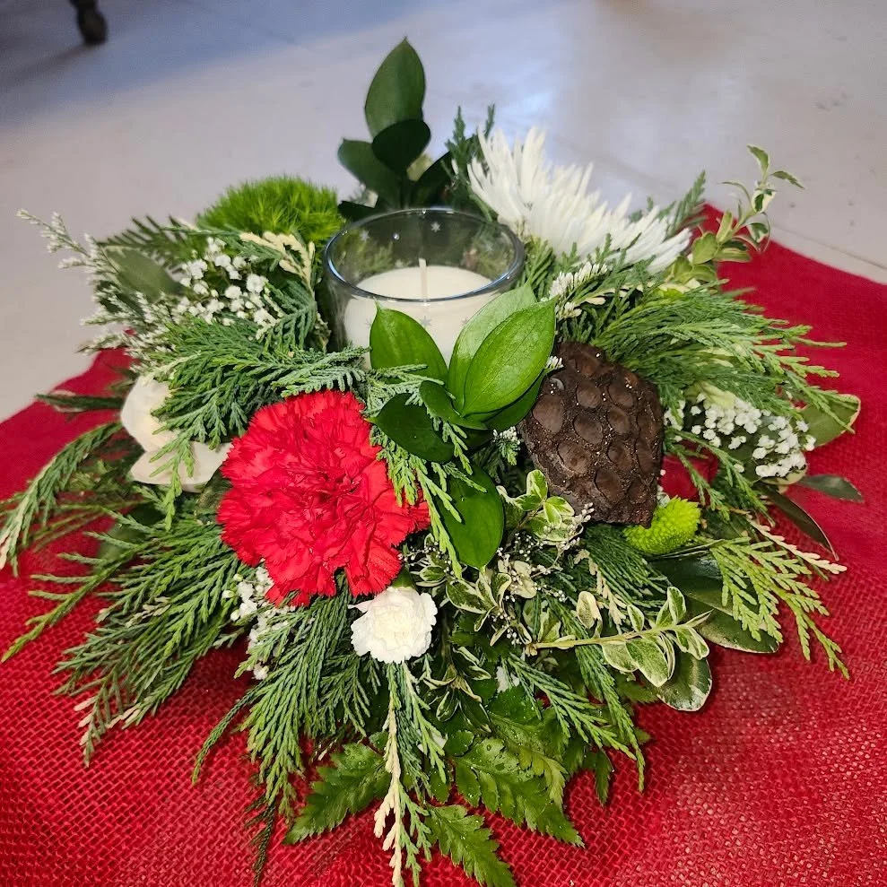 Petals has been hopping &mdash; wreaths and swags to start, then centerpieces, and now tons of small and medium arrangements alongside plenty of festive table pieces.
I&rsquo;m enjoying every bit of this creative season, and I&rsquo;m excited to see 