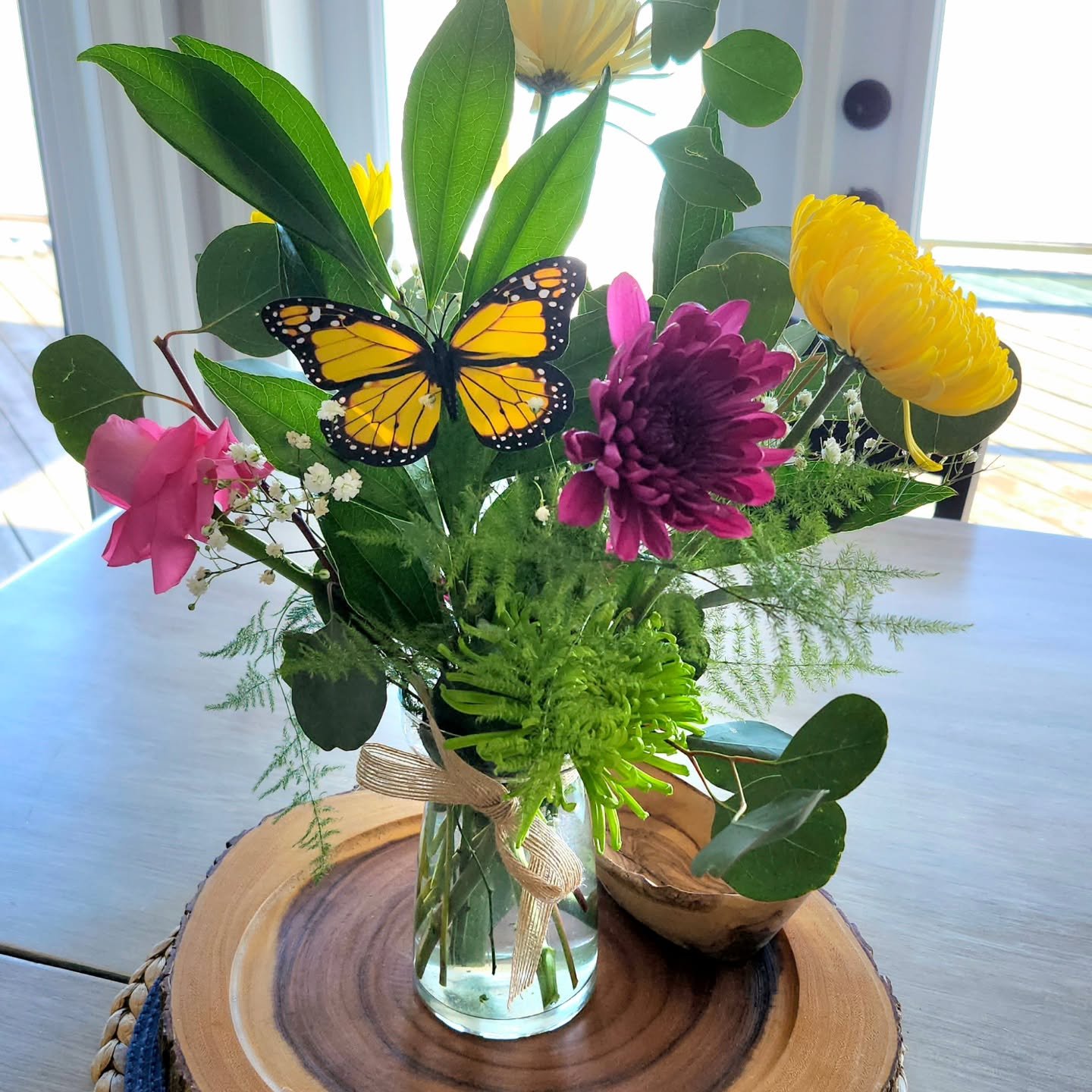Used up what I had left in flowers to make a Spring bouquet for my awesome pet sitters!!