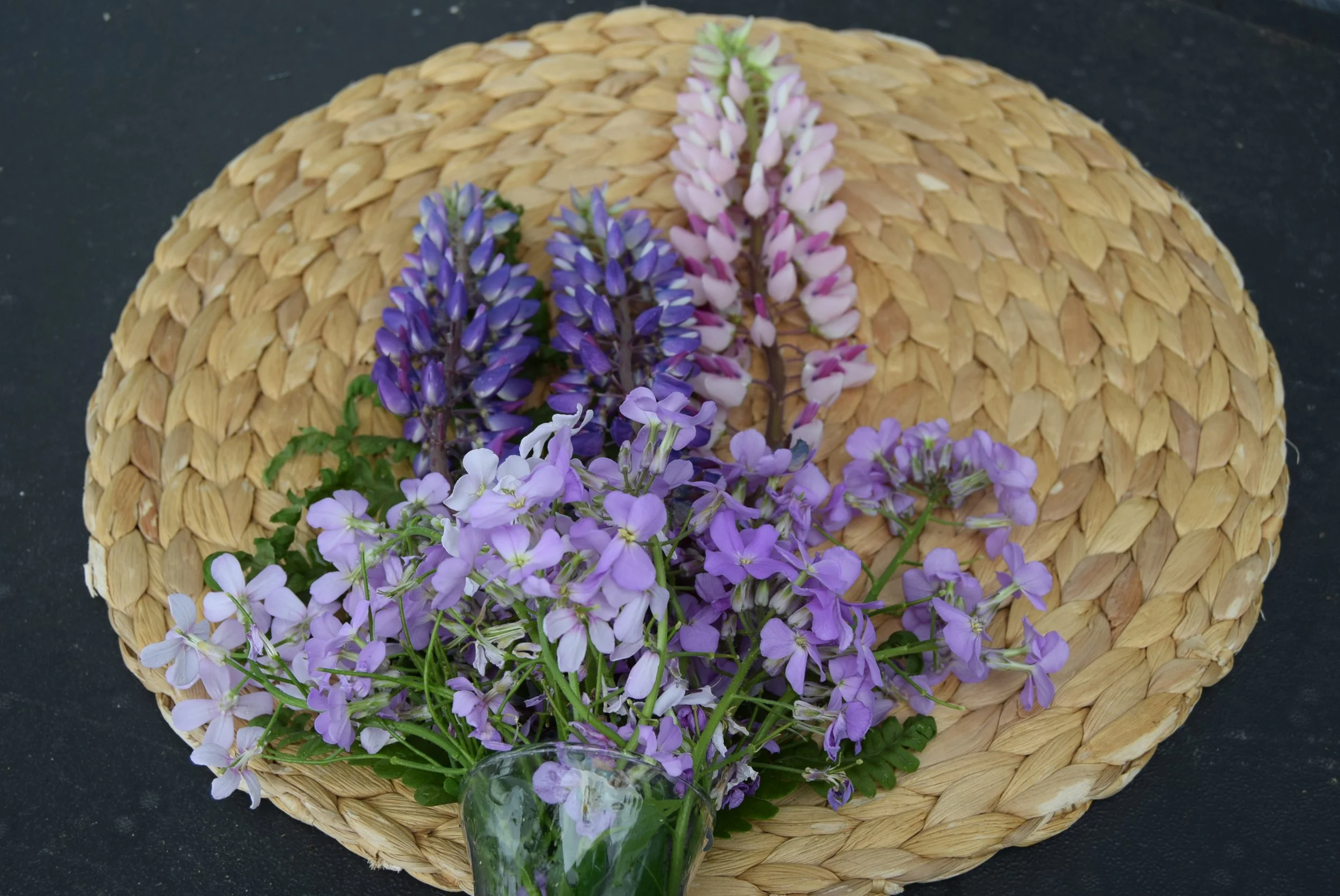 Pink, purple, and lavender flowers arrangement