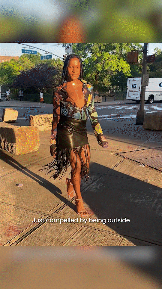 A looping gif in portrait of Richie Shazam strutting through New York City streets and posing on a balcony, whilst eye-balling the camera. The caption reads 'Steve Madden'.