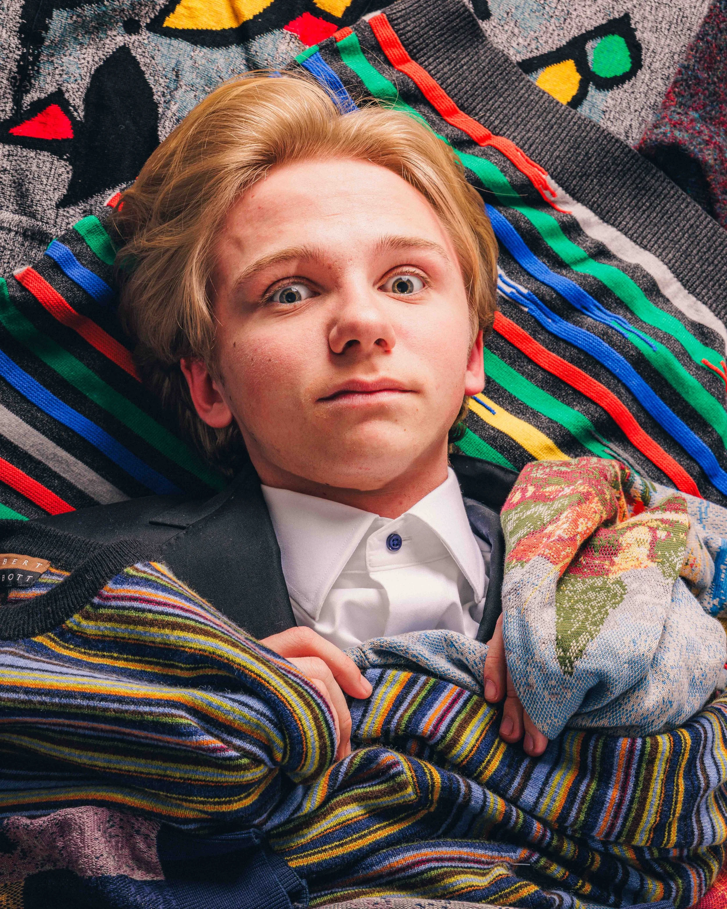 Suits and Sweaters | Hollis Bowden