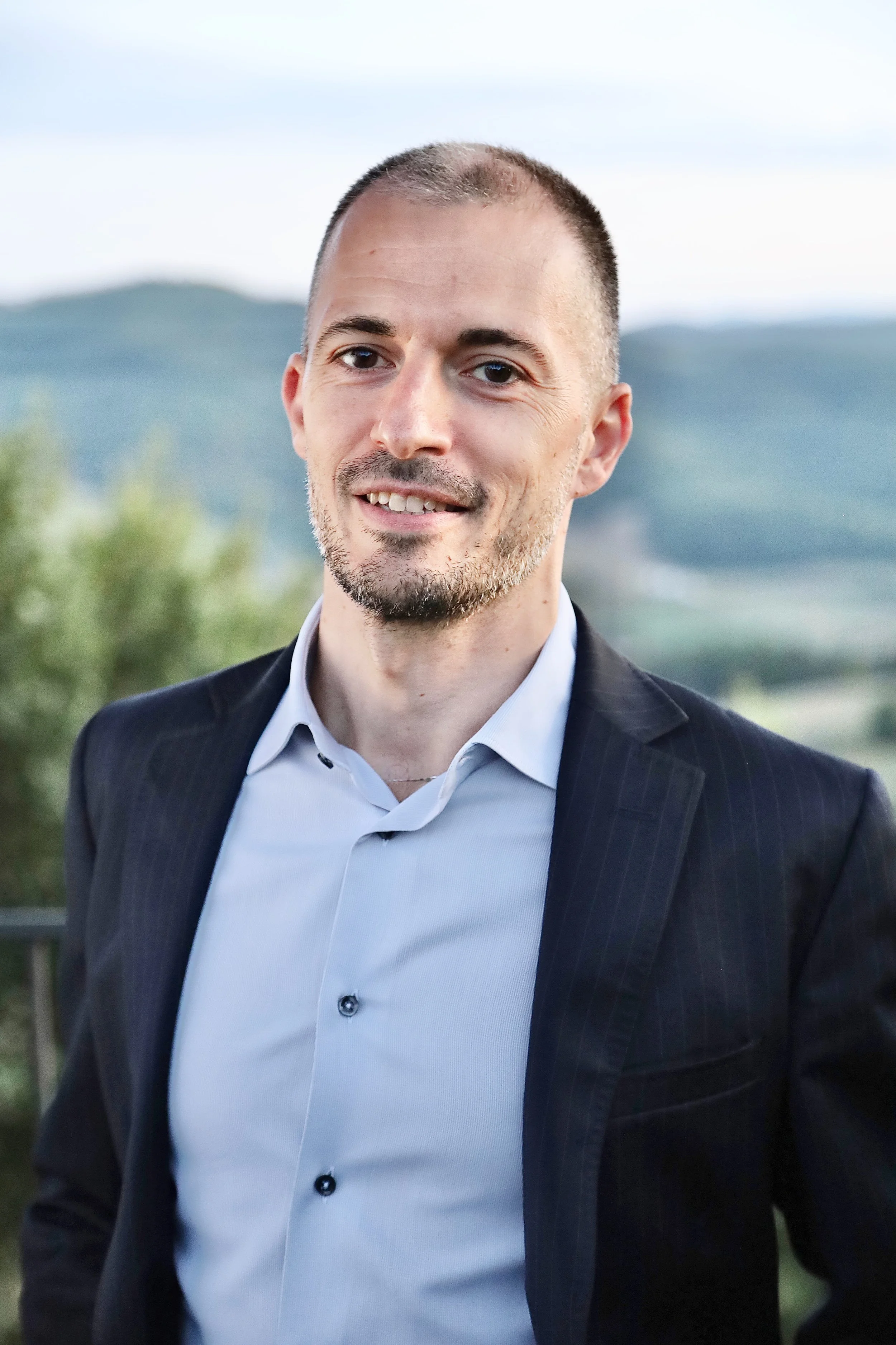 Half body portrait of Enrico, co-founder of Green Heart Restorations