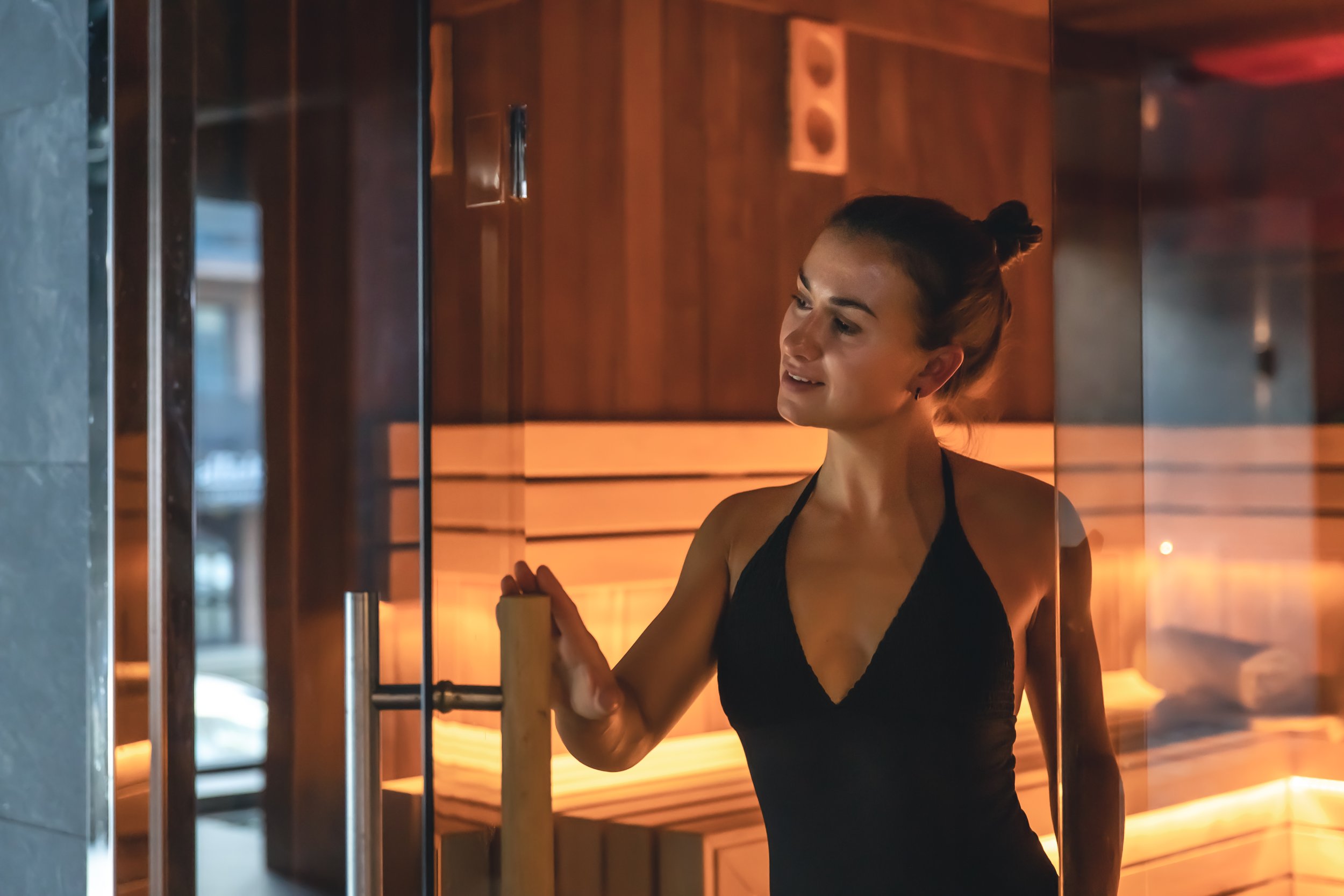 Woman using a sauna