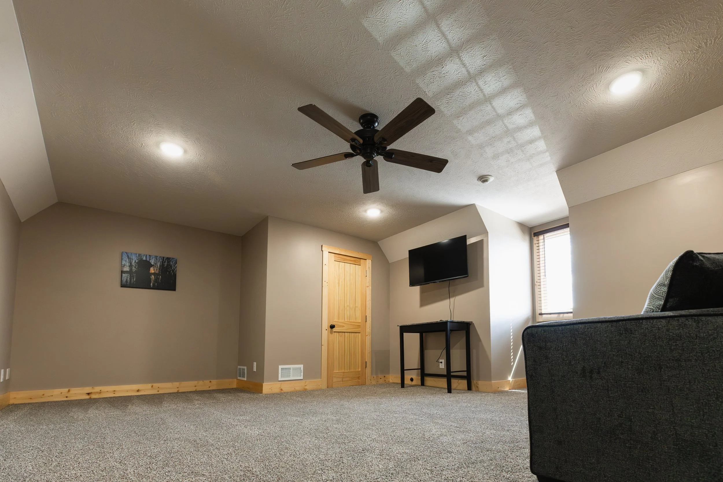 Additional television in the upstairs area available at Stockman's Lodge.