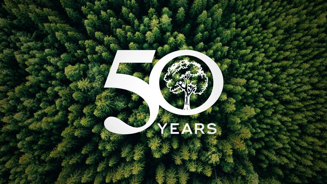 forest from above with 50 years superimposed on top