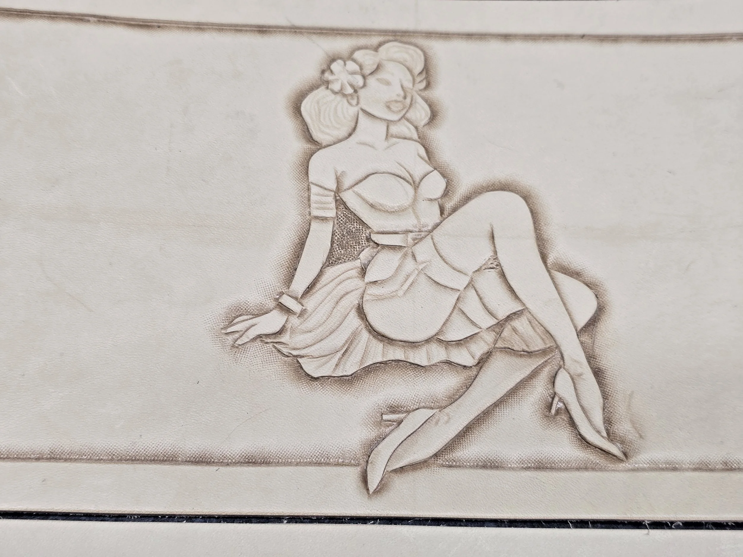 A vintage embossed illustration of a woman with short, curly hair, wearing a pinup-style outfit with a short skirt, high heels, and accessories like a bracelet and hair flower, posed provocatively with one leg crossed over the other and a hand restin