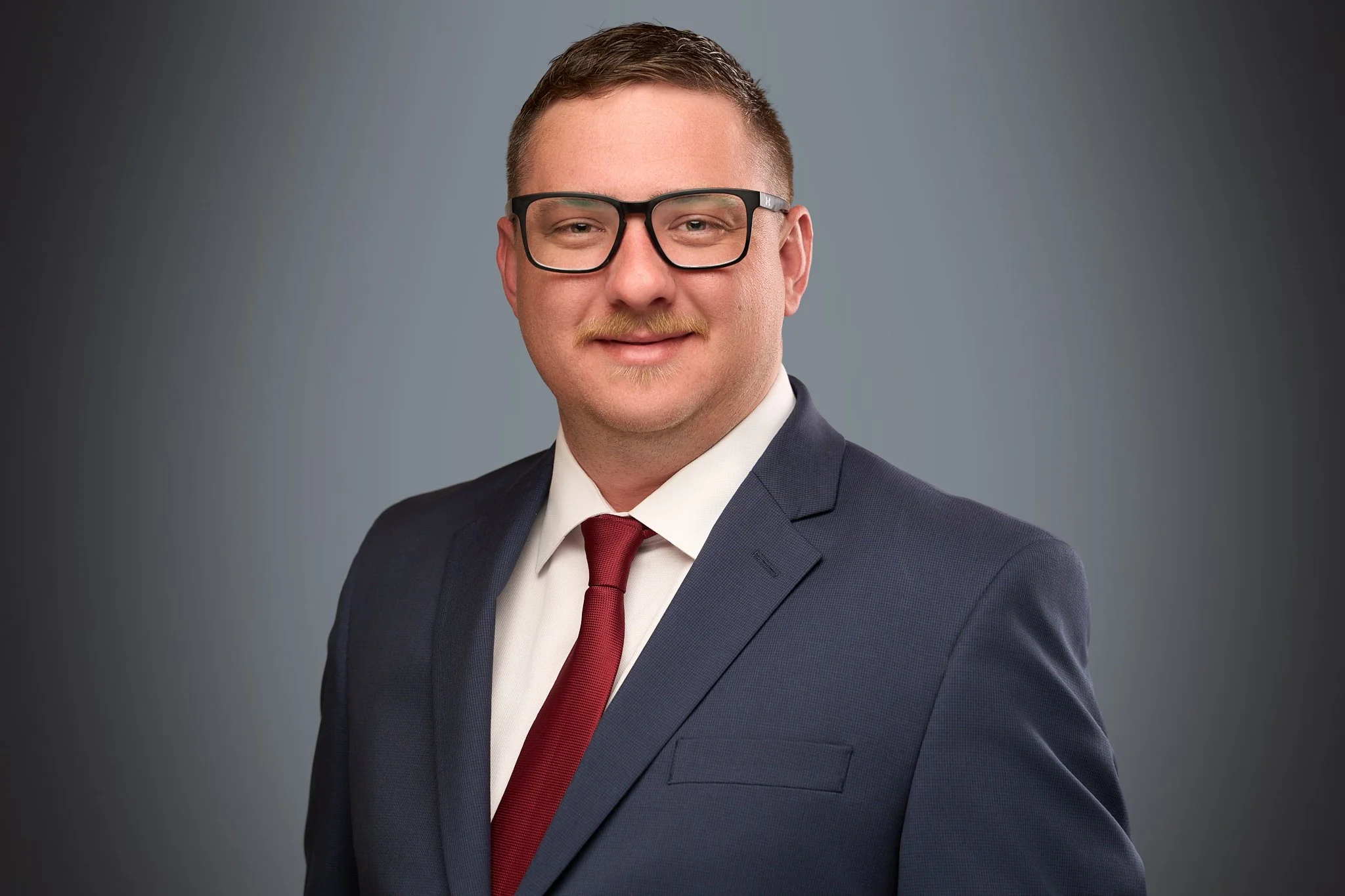Professional corporate headshot of Jordan a professional photographed by MPJ Creative.