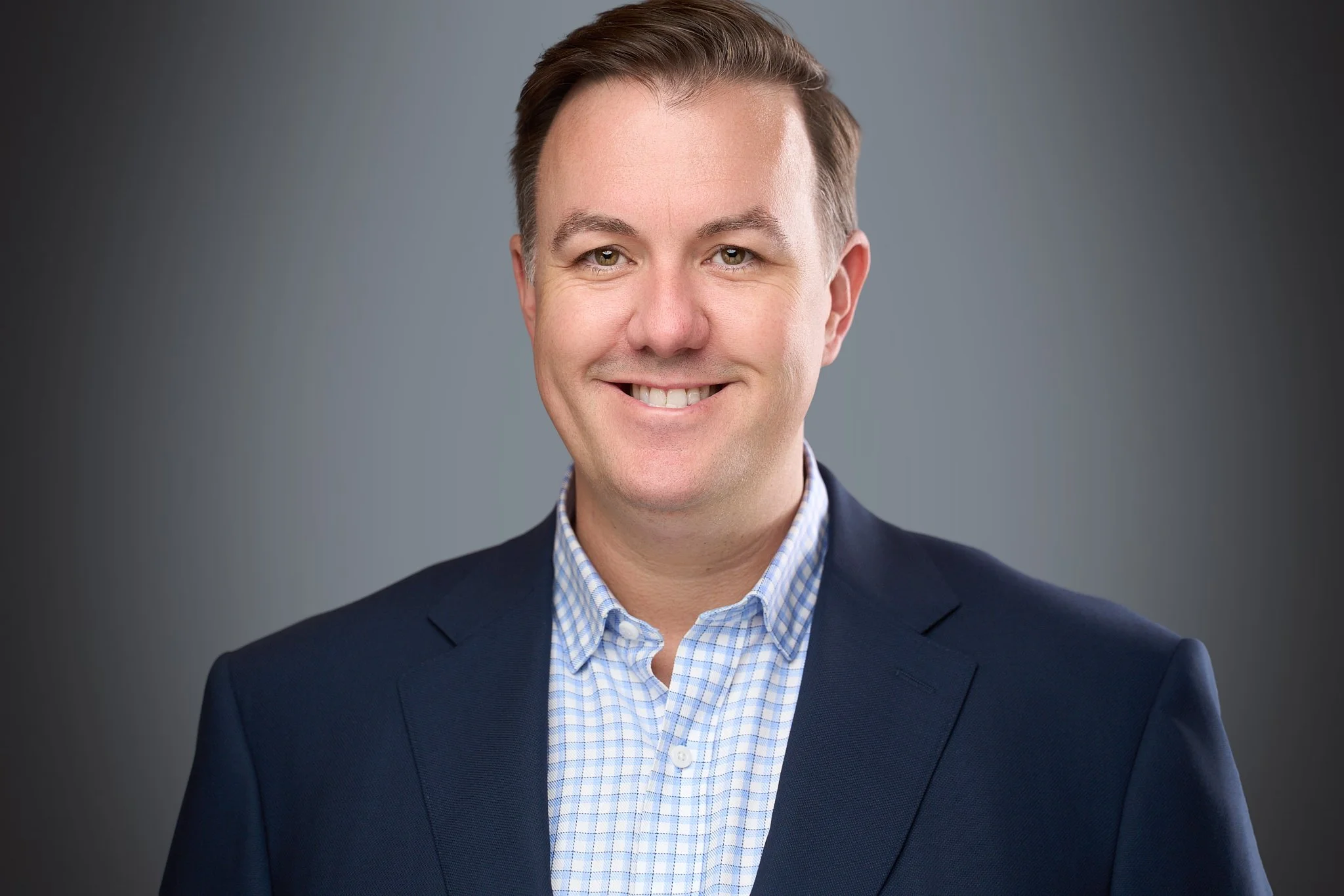Professional corporate headshot of Kyle a business professional photographed by MPJ Creative.