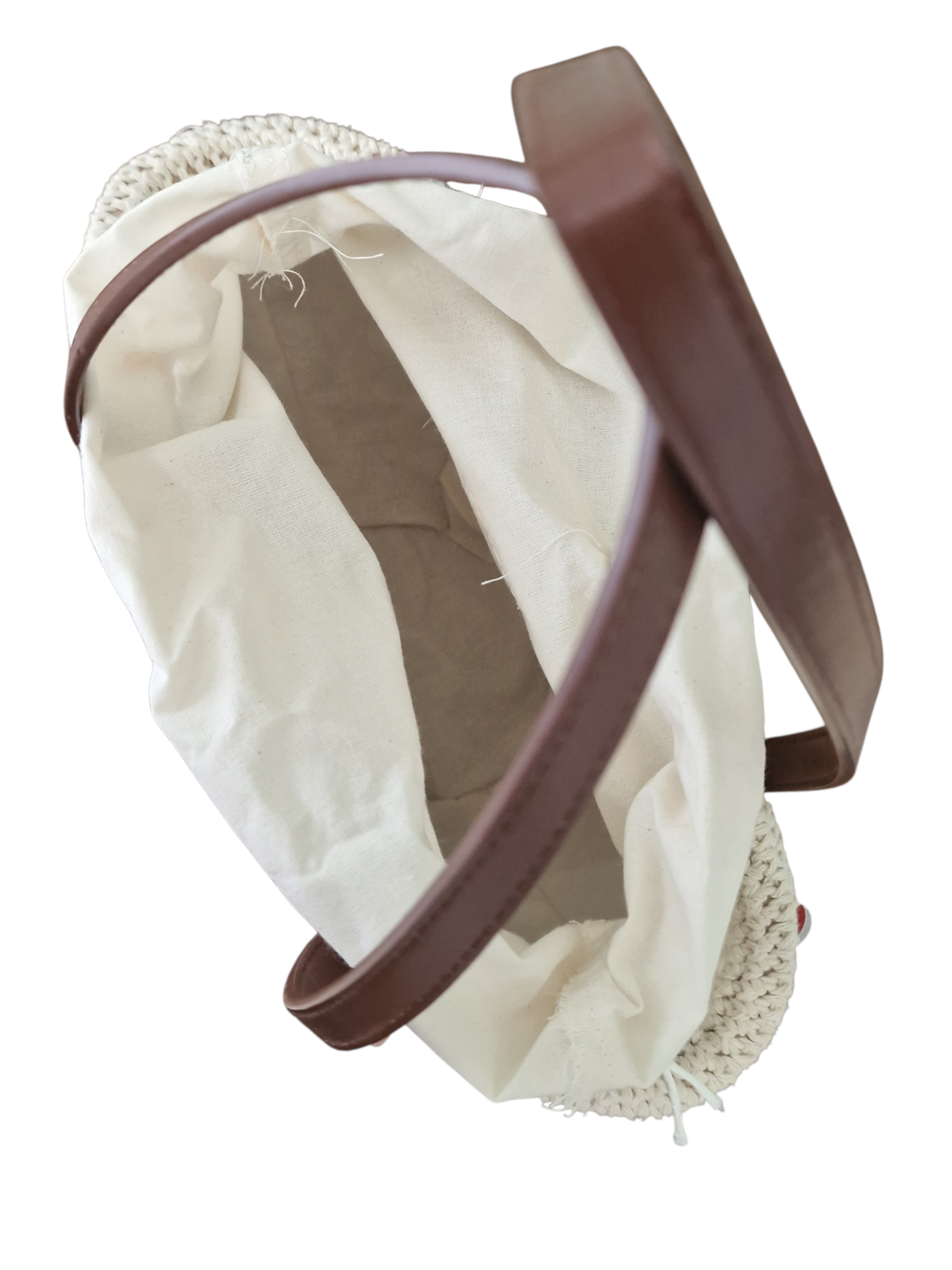 vista dell'interno della coffetta ammuri , rivestita con sacchetto in cotone color panna e tasca