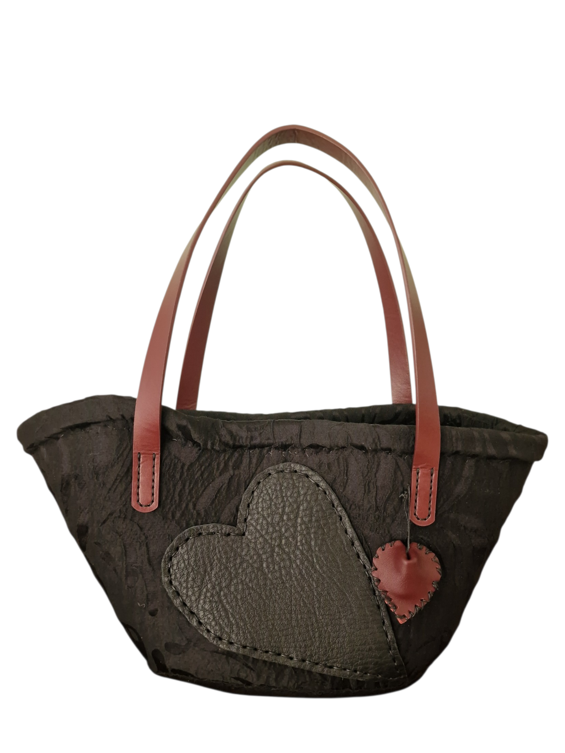 Coffa artigianale siciliana Ammuri fotografata su sfondo neutro per evidenziarne forma, colori e lavorazione manuale.