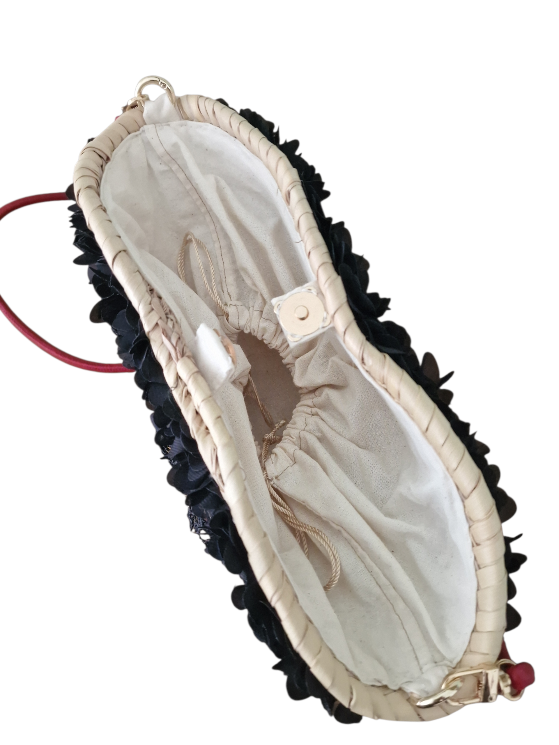 vista dall'alto della coffetta ammuri luce, interno rivestito in cotone e bottoncino magnetico