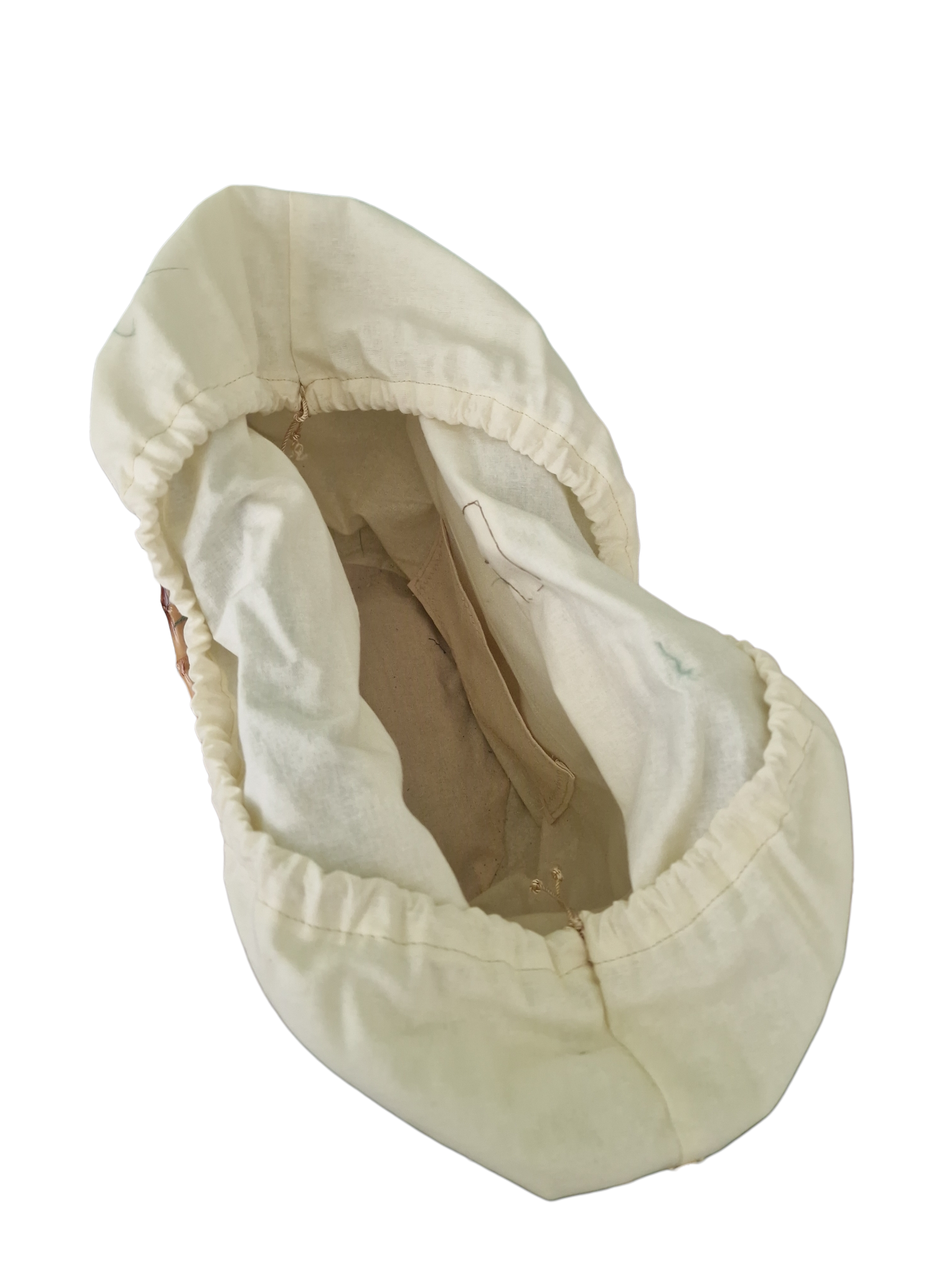 vista dall'alto della borsa ammalia rivestita internamente con sacchetto in cotone grezzo color panna e tasca