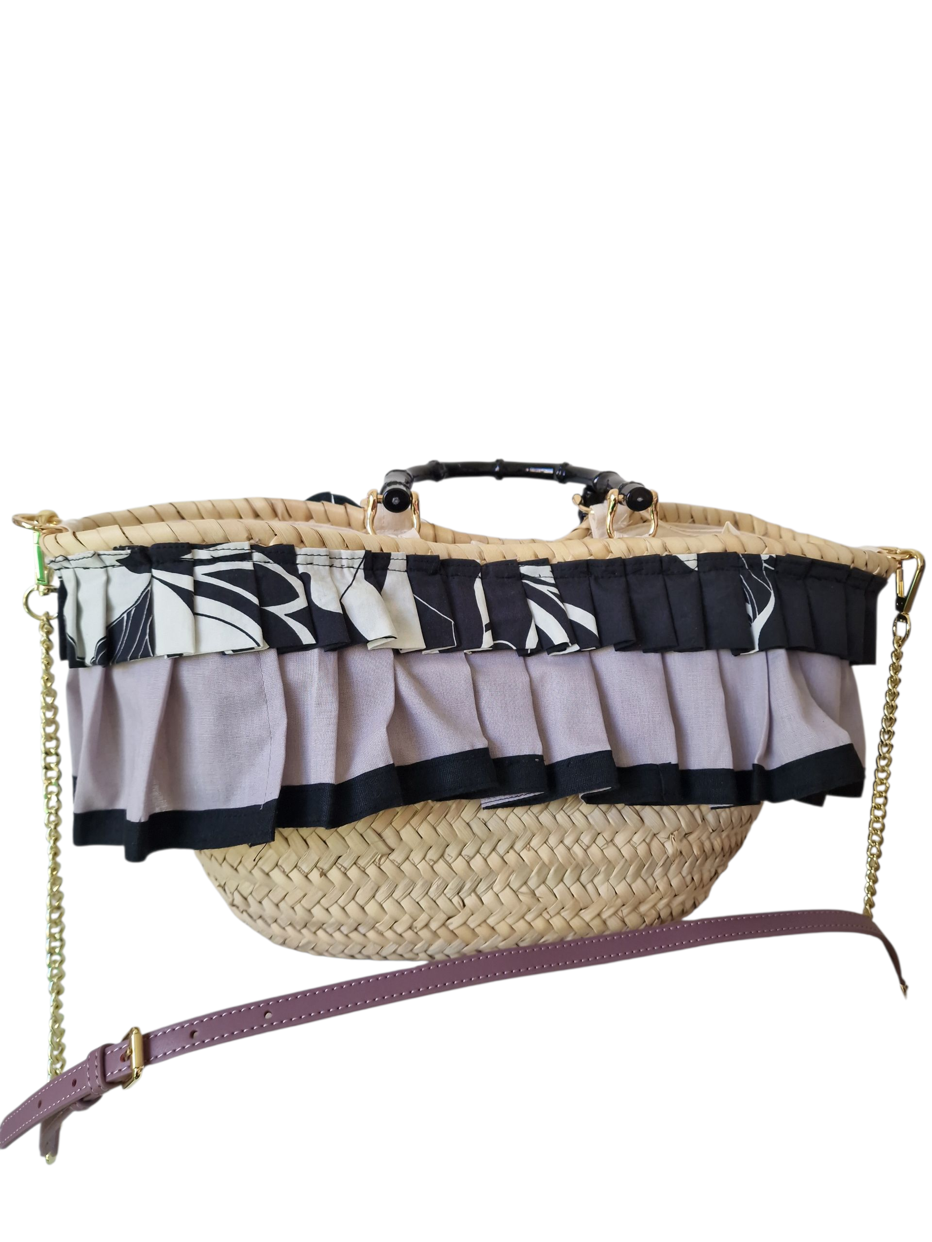 Coffa artigianale Ammuri Sicilia con balze in tessuto, fiore in pelle e tracolla in pelle malva.