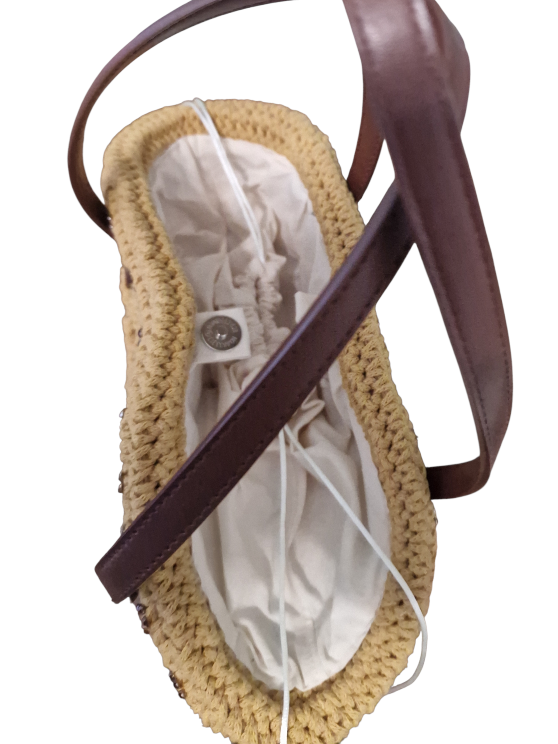 vista dall'alto della borsa zagara con chiusura con bottoncino magnetico e sacchetto