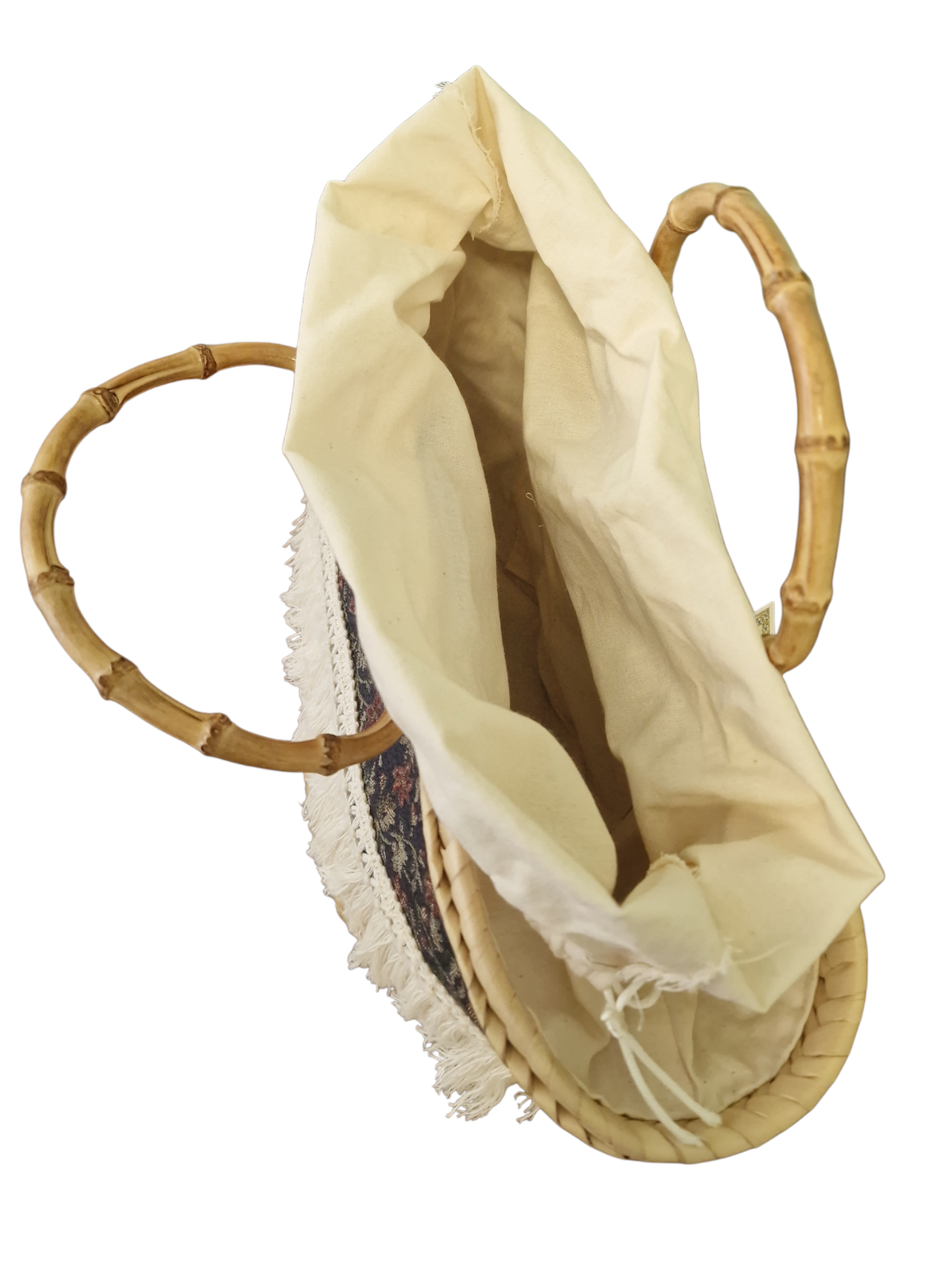 Interno della borsa Romanzina con sacchetto in cotone naturale, pensato per custodire gli oggetti personali.