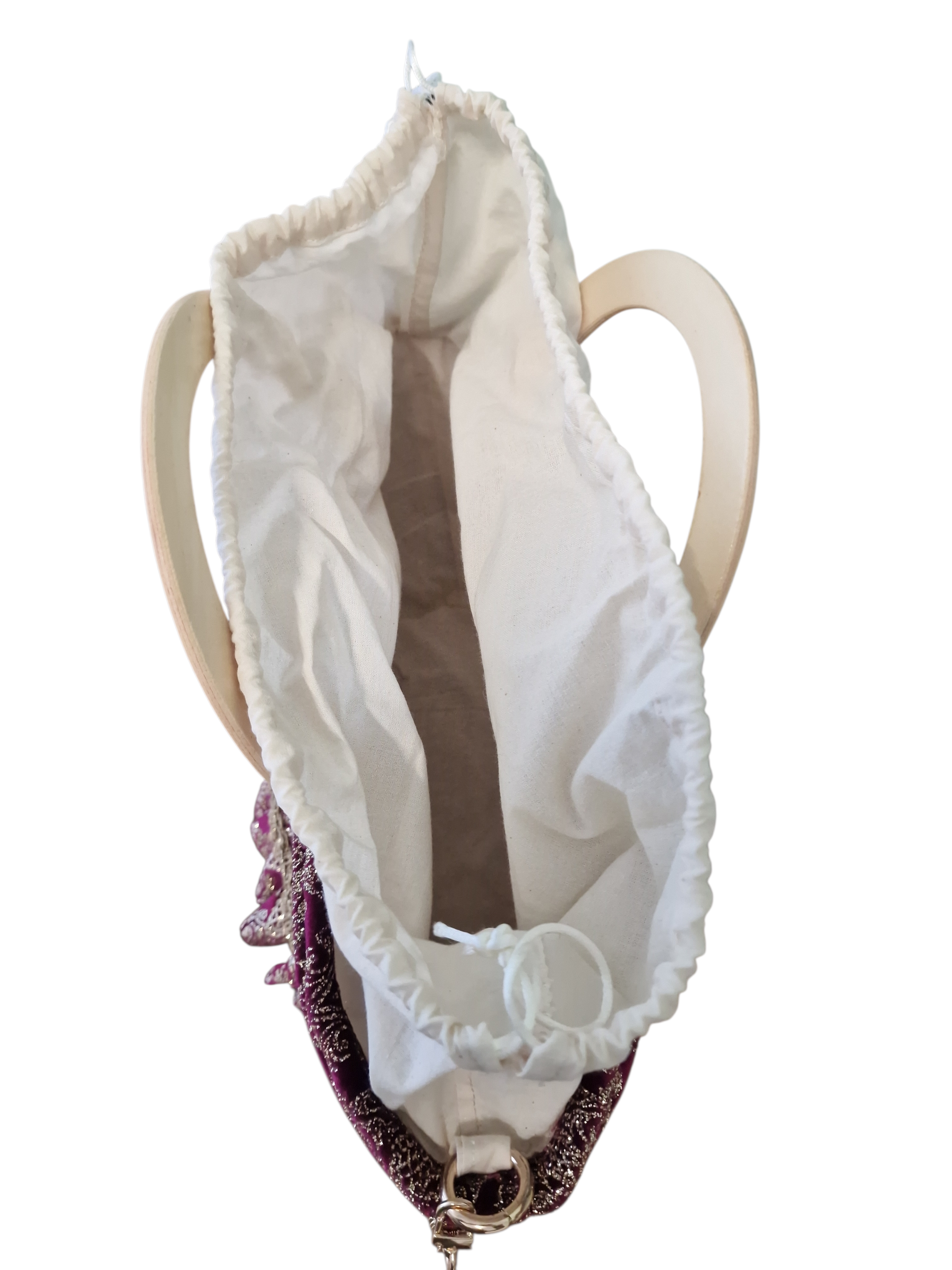 vista ravvicinata del sacchetto interno della borsa Reggina fatto in cotone grezzo color panna e tasca interna