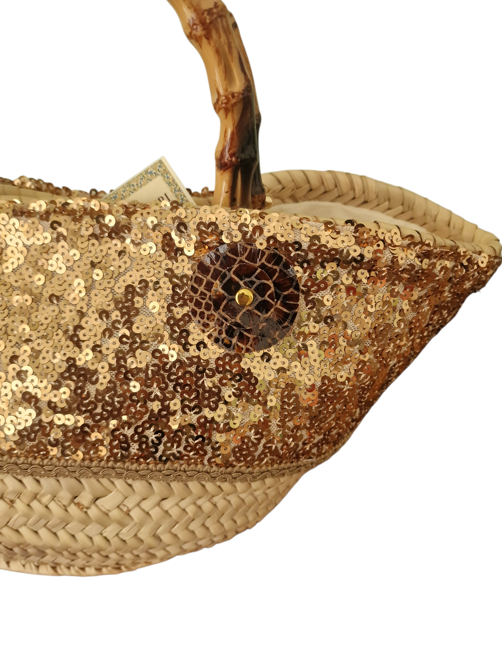 dettaglio della coffa borsa splendura , fiore in pelle naturale e pailette