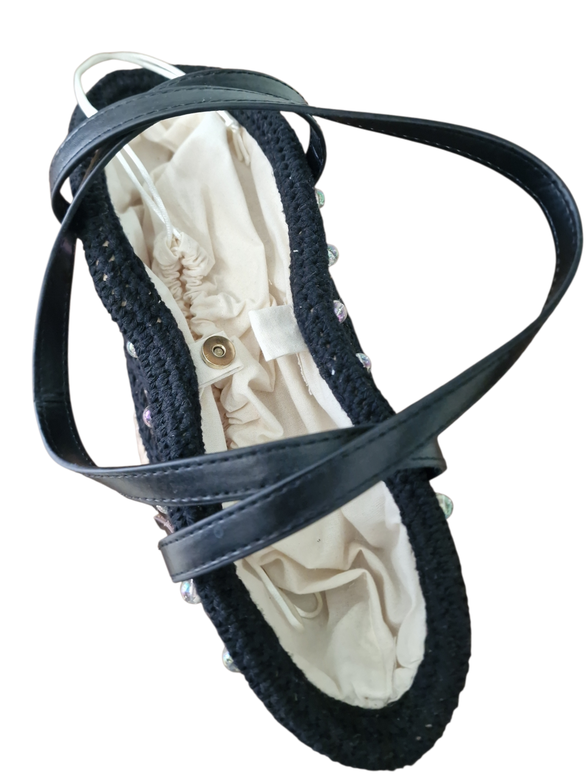 vista dall'alto della coffetta luna d'ammuri con sacchetto interno e chiusura con bottoncino magnetico