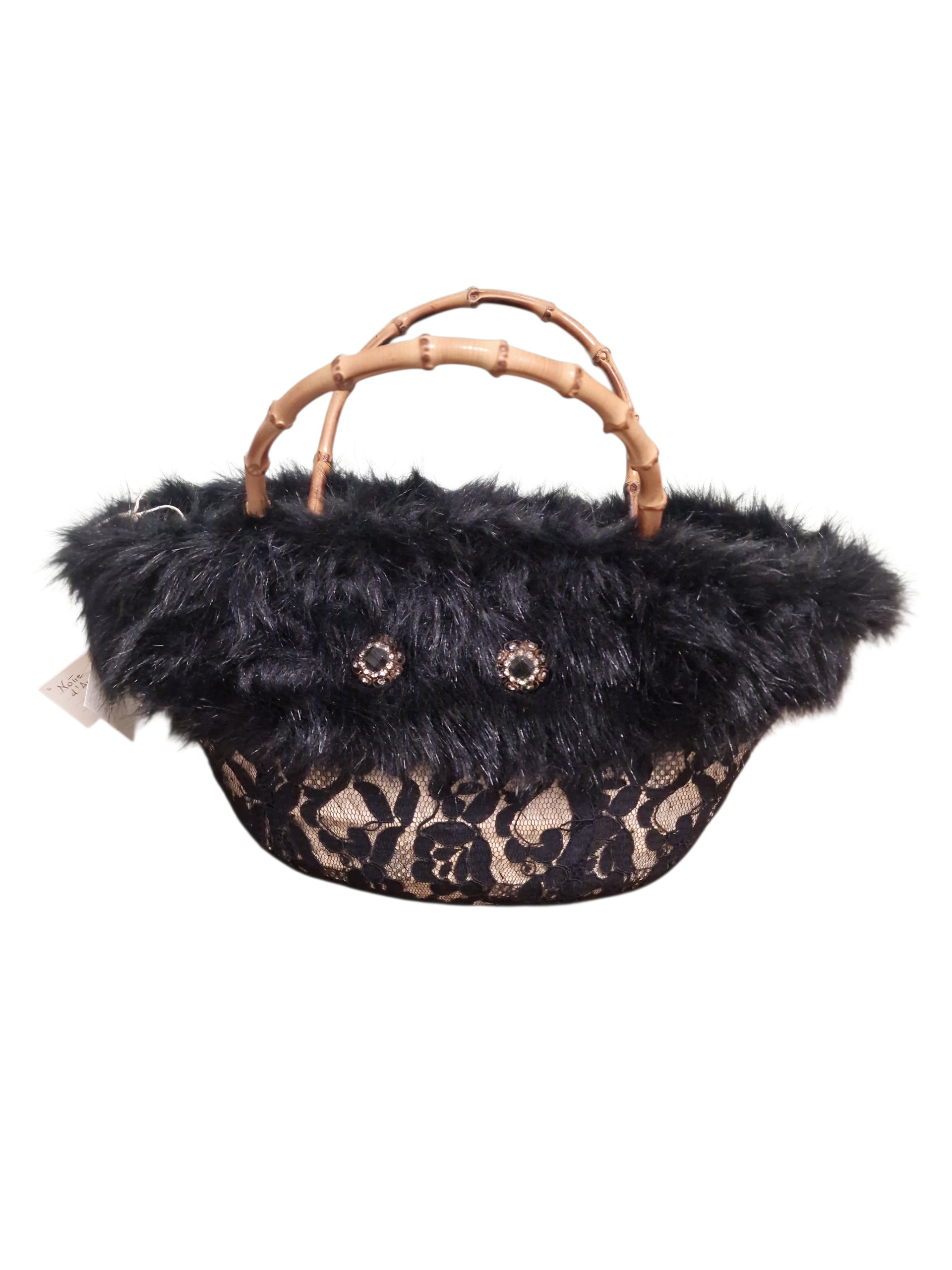 foto della borsa notte d'ammuri elegante e rivestita in pizzo e pelliccia con manici in bambù