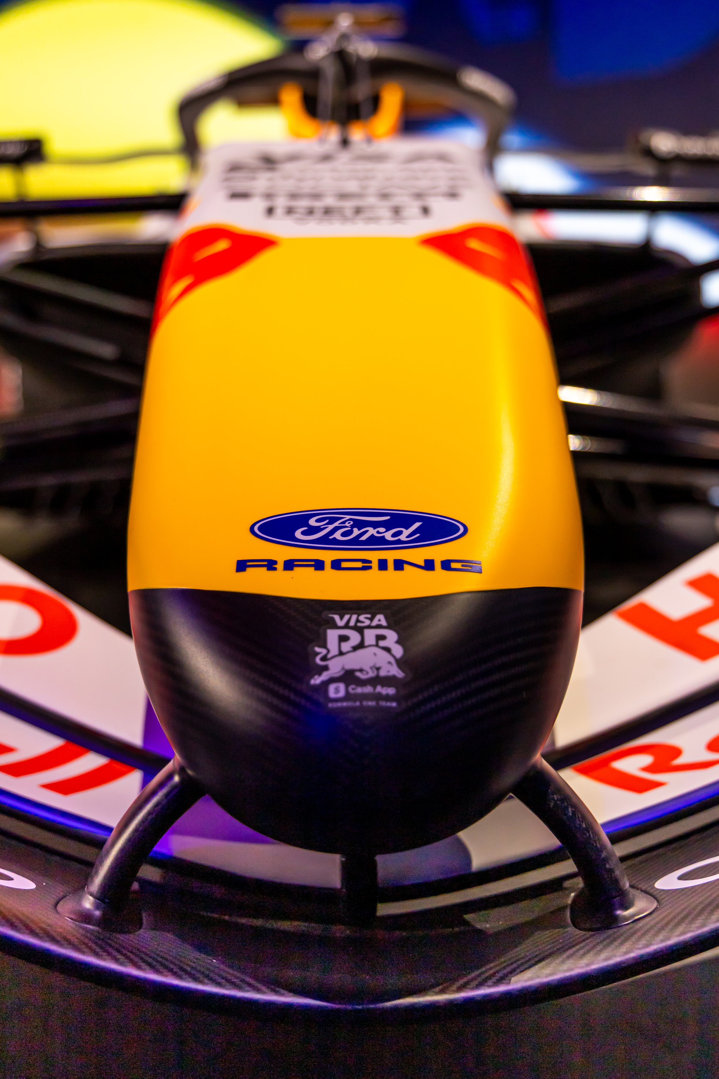 Close-up of a Red Bull Racing Formula 1 car nose, featuring Ford Racing and Visa logos.