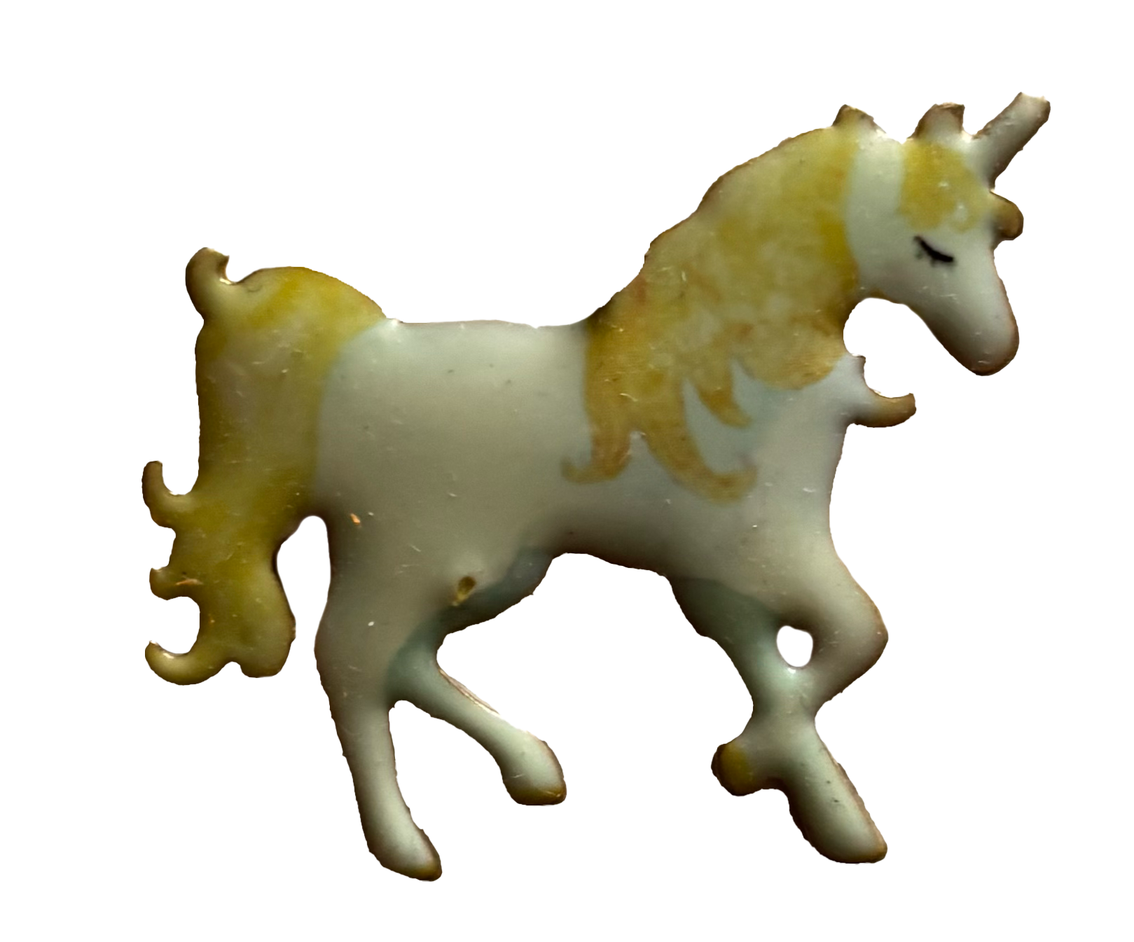 A charm shaped like a unicorn with a white body and a golden mane, tail, and horn.