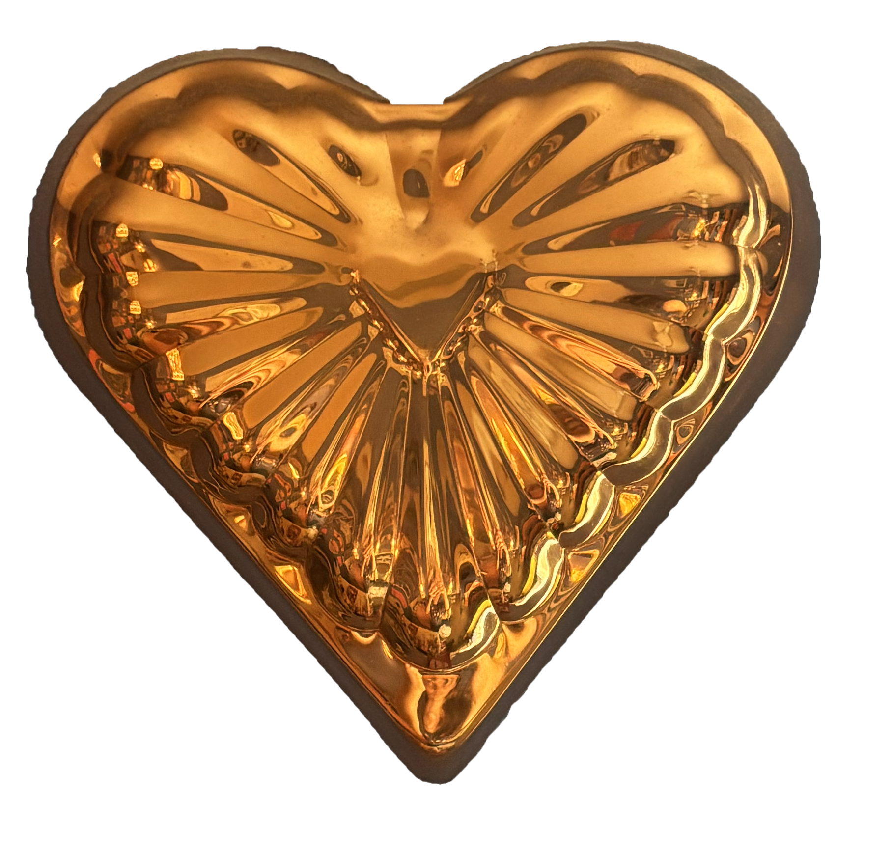 A gold-colored, heart-shaped decorative tray with a ribbed, shiny surface.