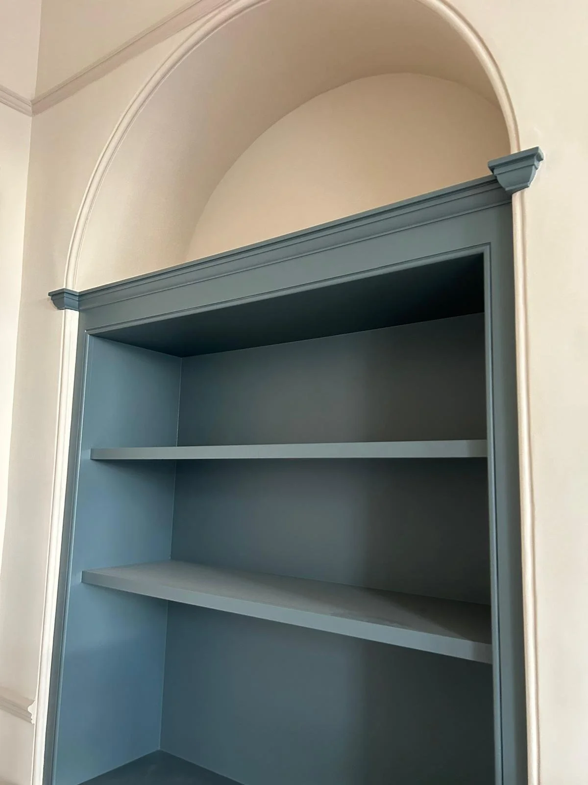 bespoke built in book case for alcoves. carpenter needed in Bristol, Long Ashton, Somerset, Brislington. Blue book shelf. handy man carpenter near me Bristol