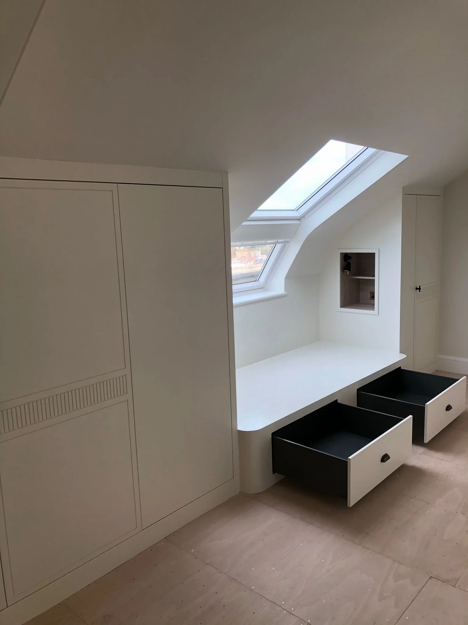 bespoke fitted wardrobe for awkward loft space in Bristol. carpenter to fix wardrobes. carpentry south Gloucestershire  