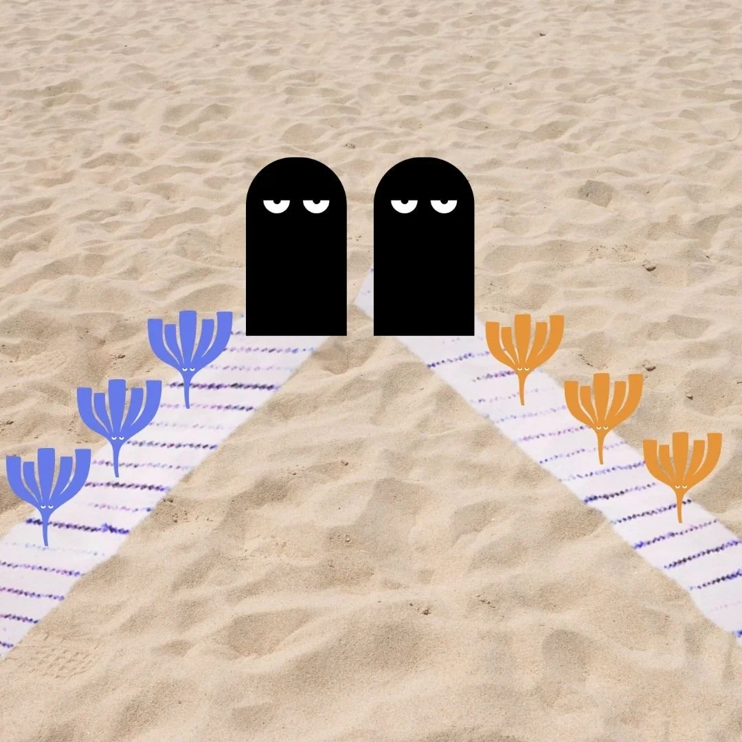 Our Kind Therapy cartoon logo figures on walking path on beach