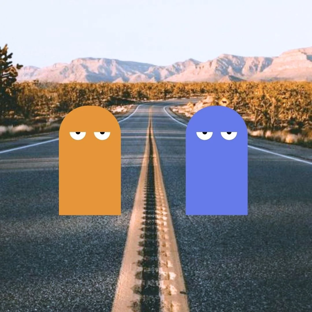 Two Our Kind Therapy cartoon logo images standing on road divided by road yellow line