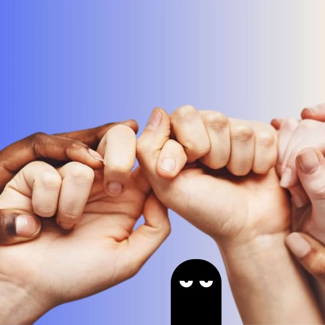 hands of all races holding each other and Our Kind Therapy cartoon logo figure