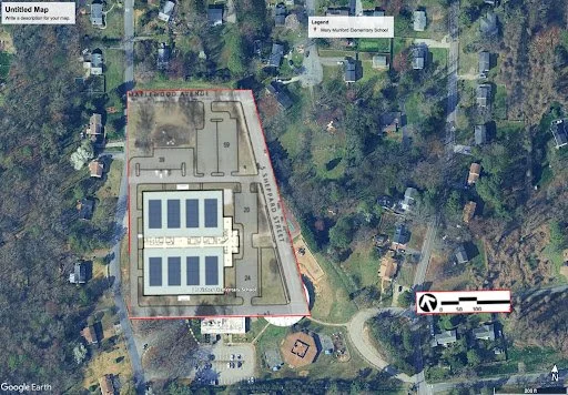 Satellite map showing Mary Murph Elementary School with surrounding residential area, trees, and streets. The school grounds include multiple field areas and parking lots.