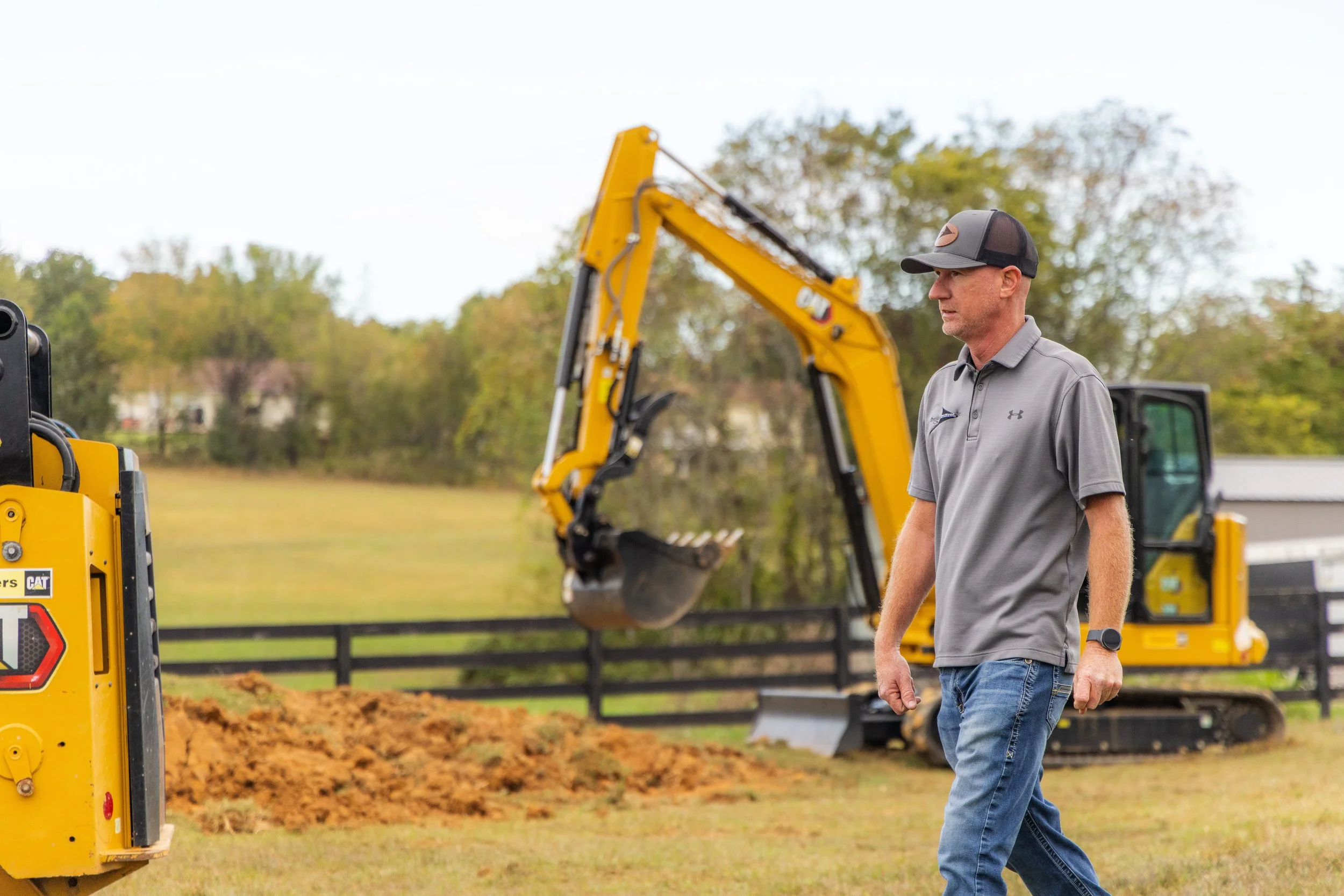 Brandon Parrot, Owner of Precision Structures, Inc. working at a job.