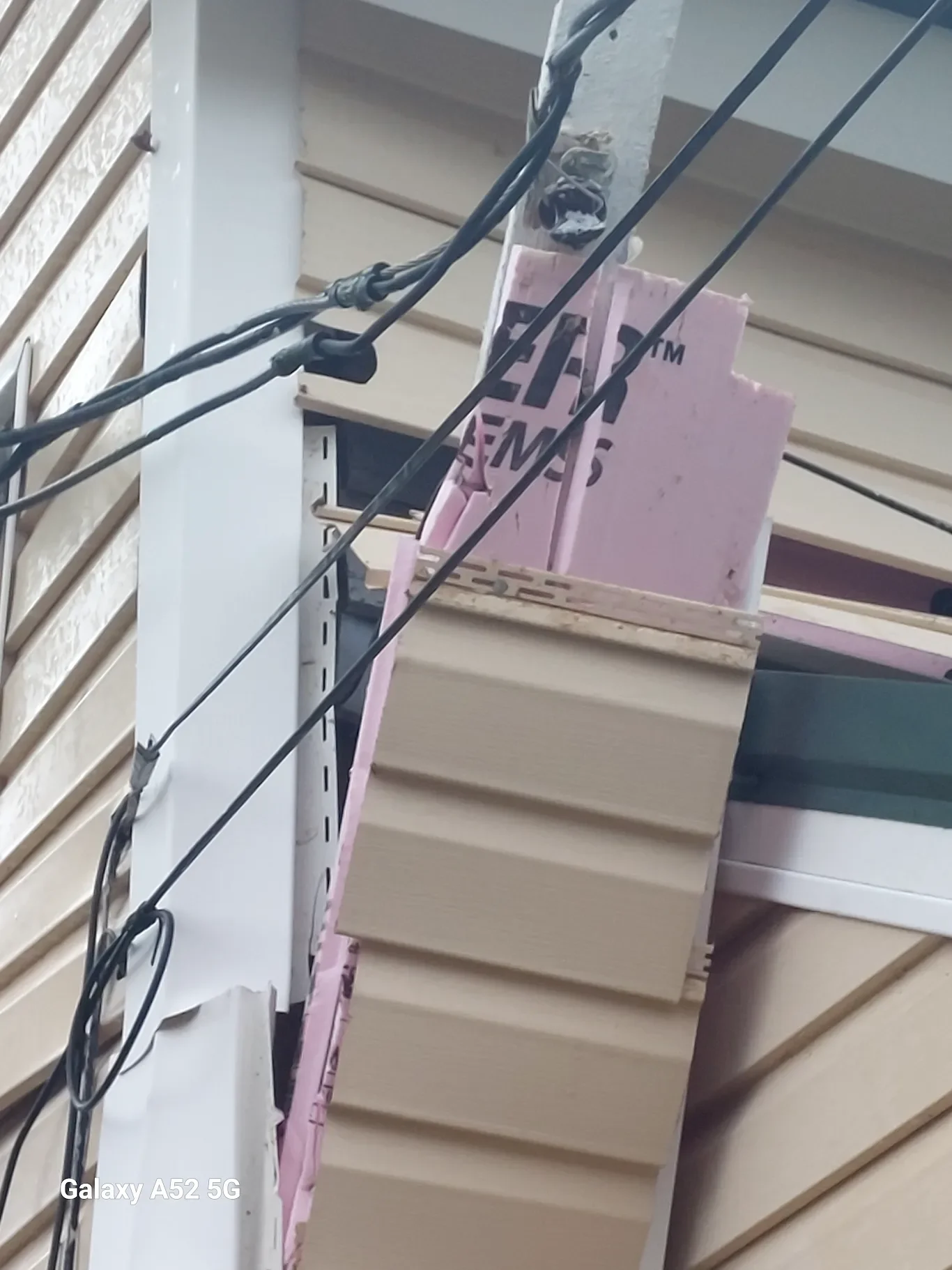 Image of the damage after a tree fell on a house