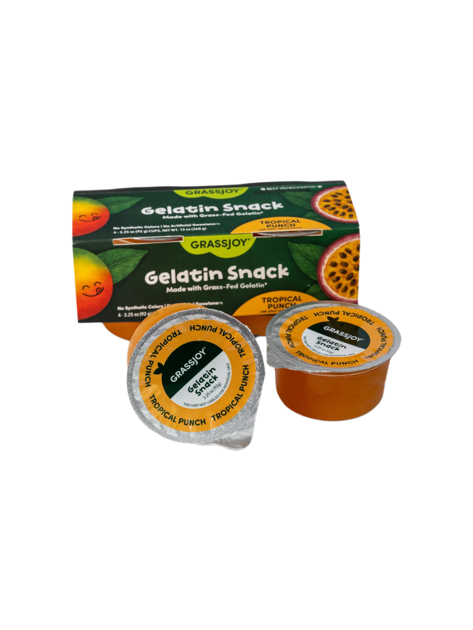 Package of GrassJoy grass-fed gelatin snack in tropical punch flavor, featuring a smiling mango illustration and a halved passion fruit on the label. Contains four cups, no added sugar, no artificial ingredients.