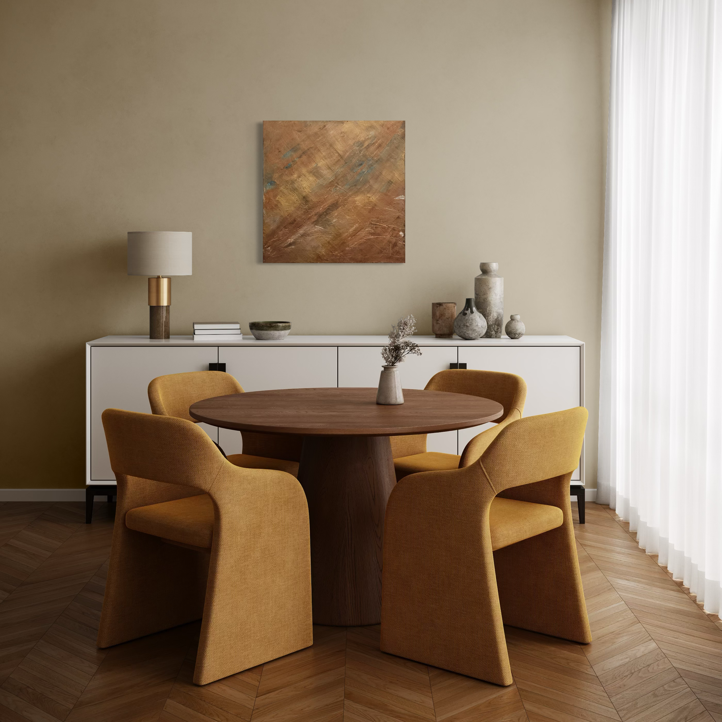 Dining room with a round wooden table, four yellow upholstered chairs, a white sideboard with vases and a lamp, abstract painting on a beige wall, and sheer white curtains.