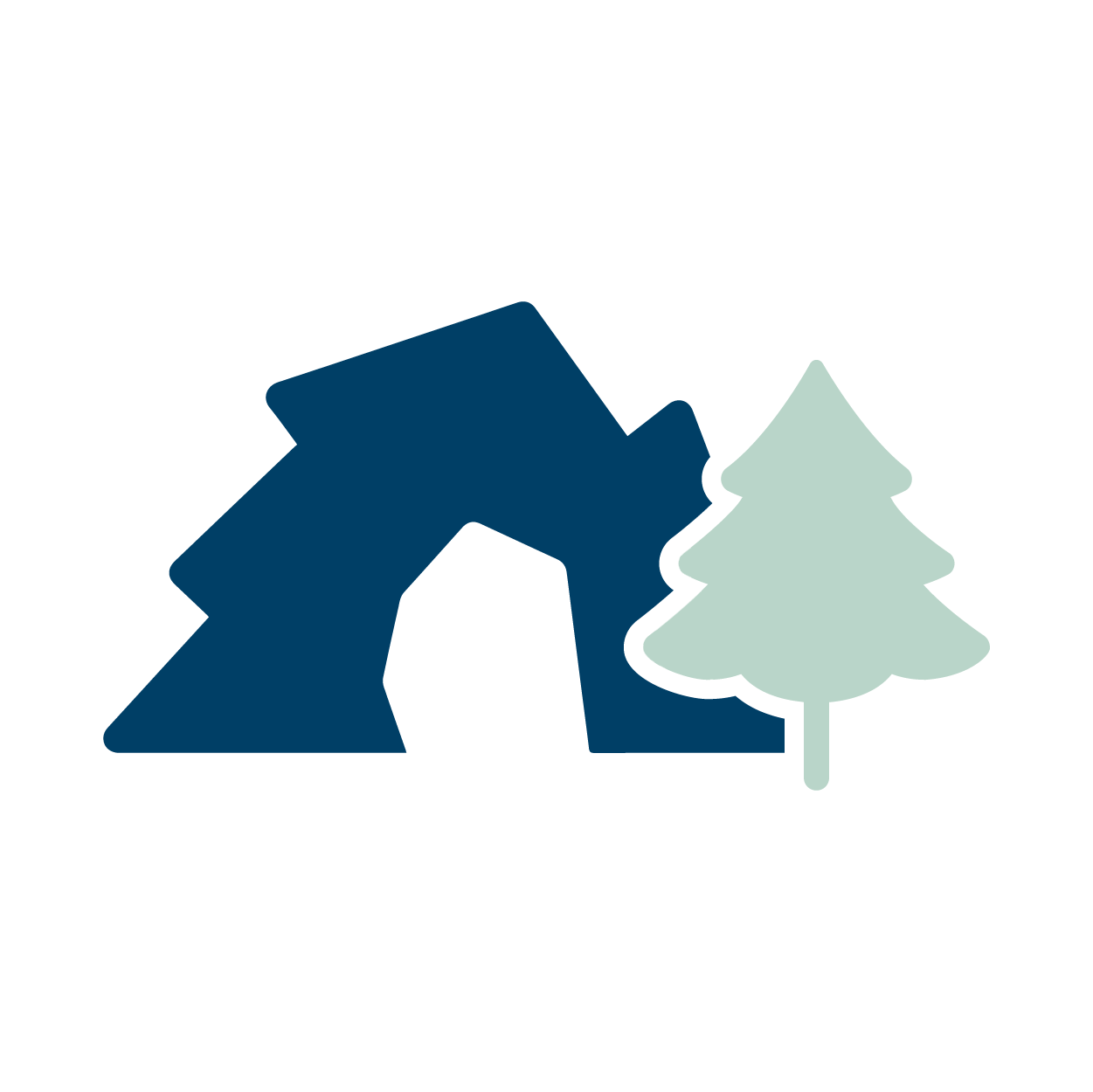 Blue mountain with a snow-capped peak and a green pine tree in front of it.