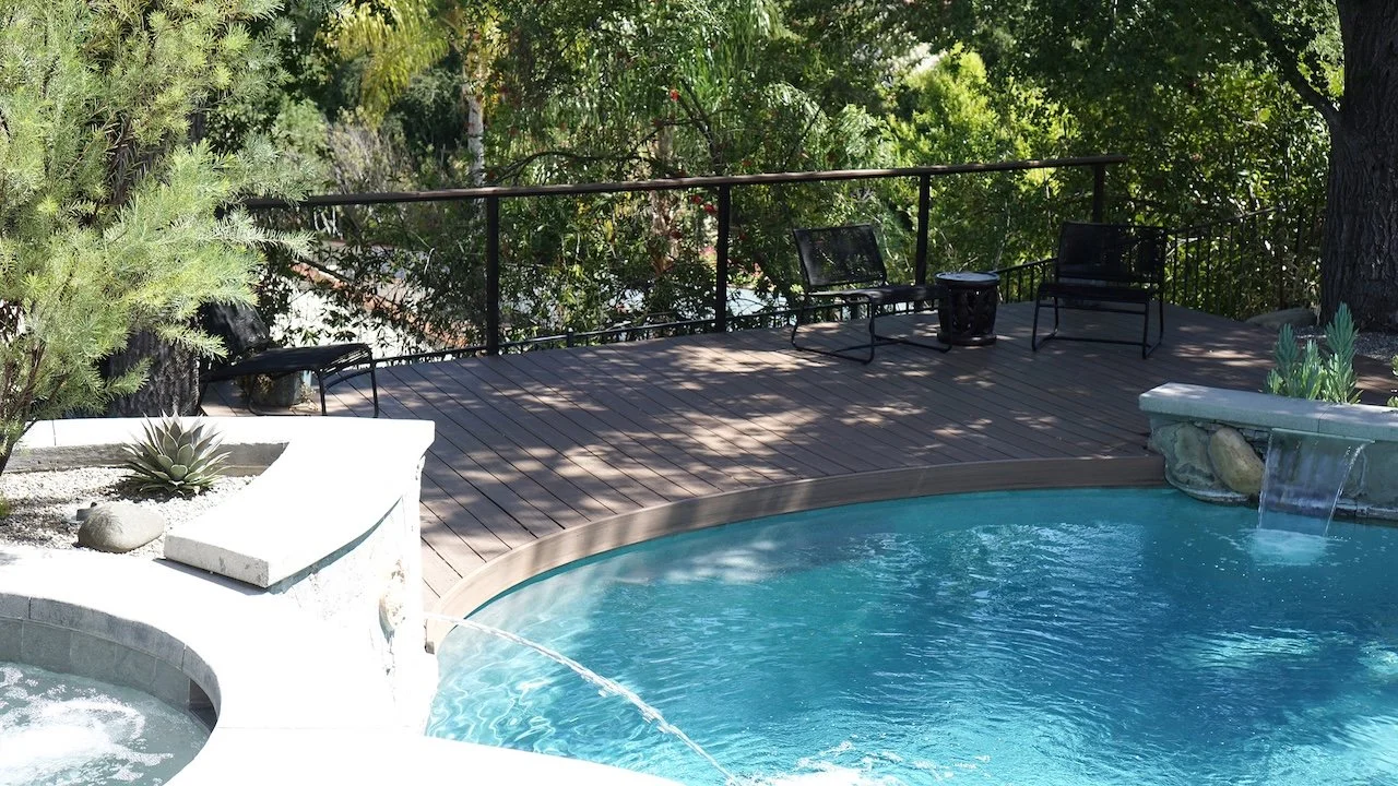 TimberTech composite pool deck with bluestone and new tile detailing