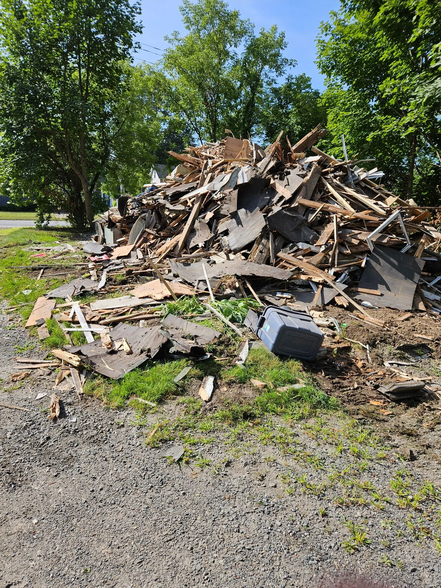 This is a mid-demo photo capturing the stage once the structure has been taken down but not yet cleared. 
