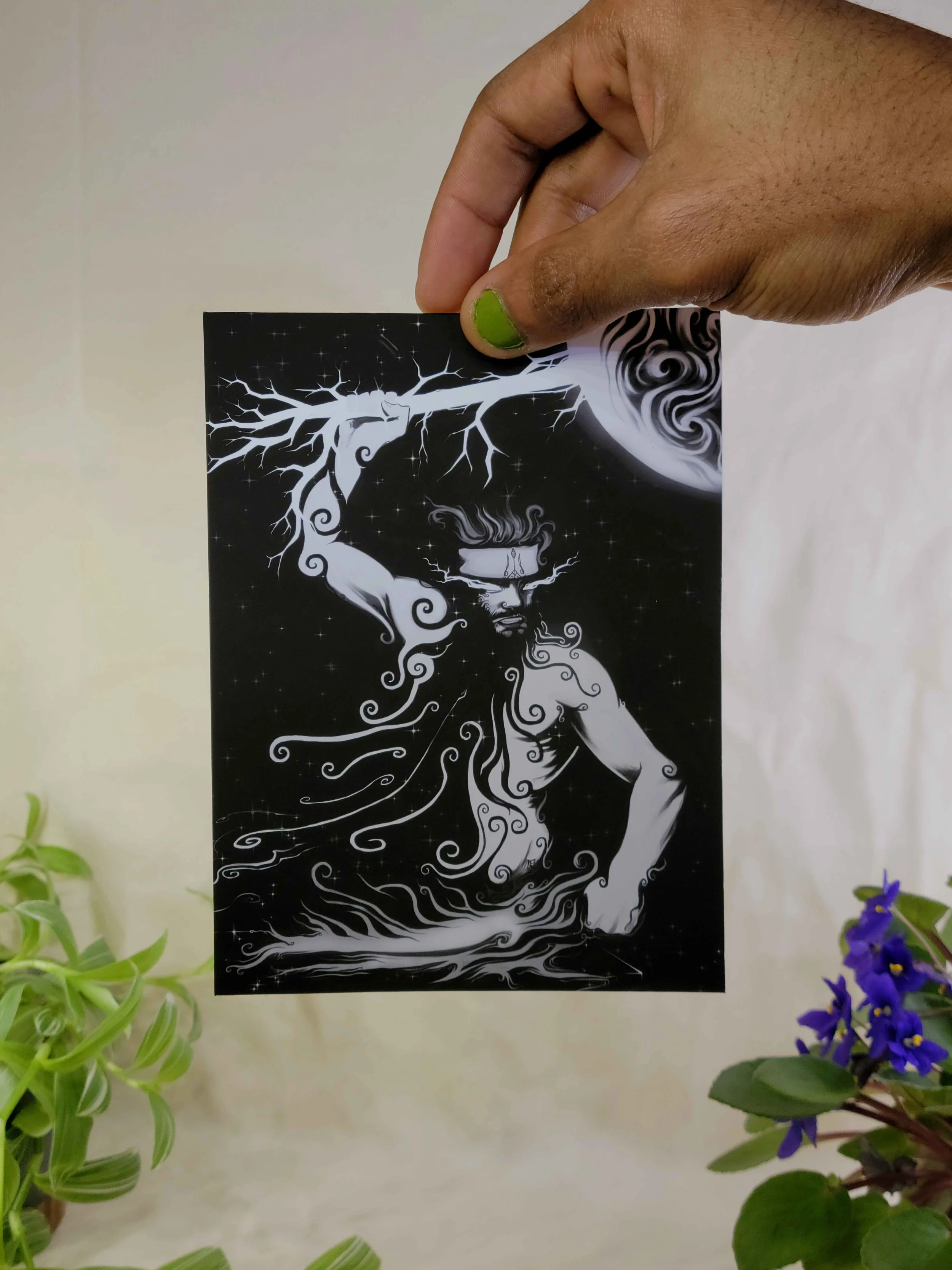 Ogou god forger in hand.jpg